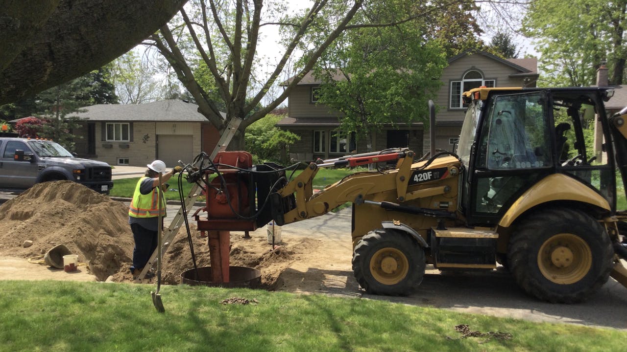 Working on pipe burst with truck