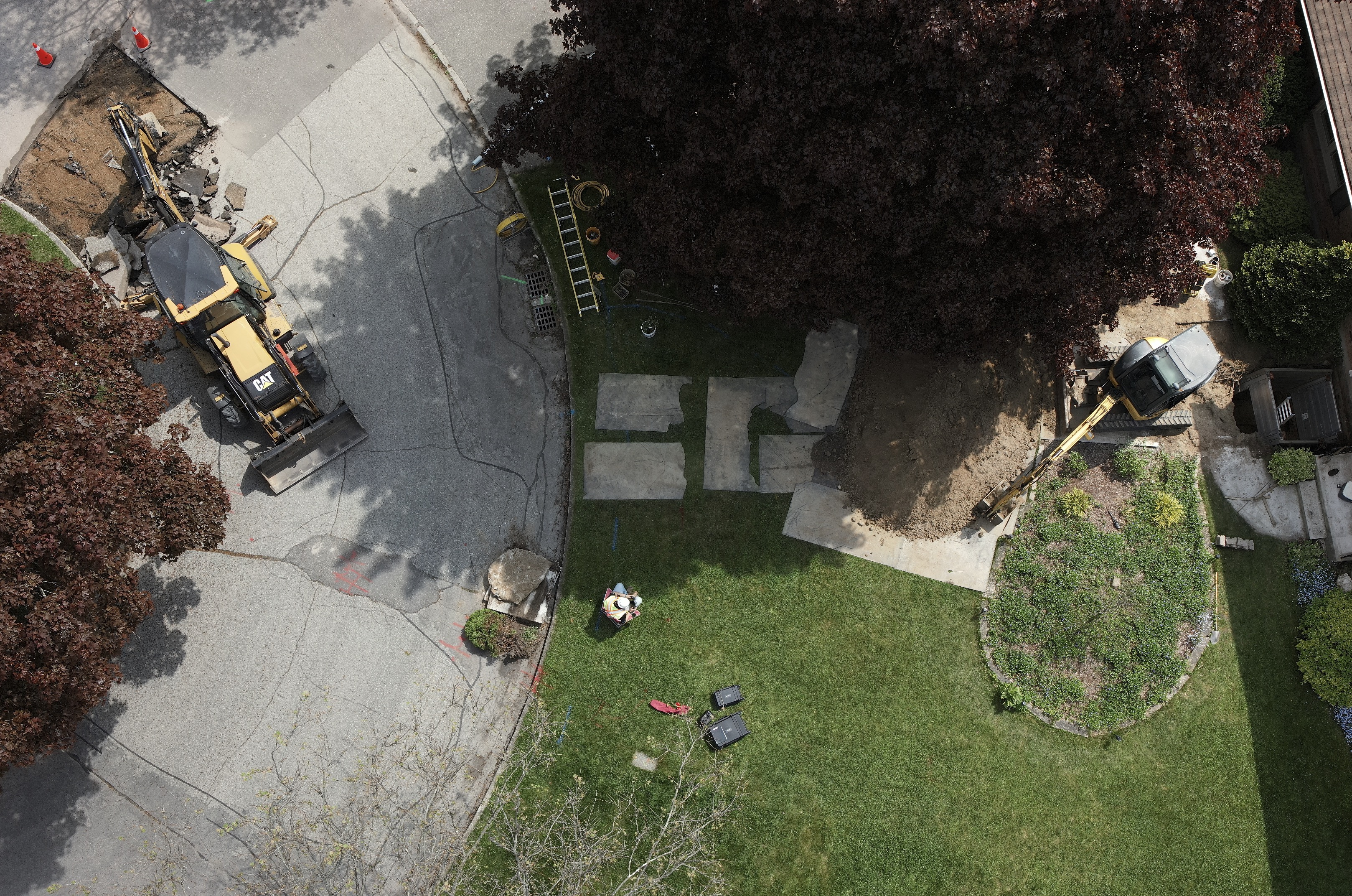 Overhead view of site with truck and property