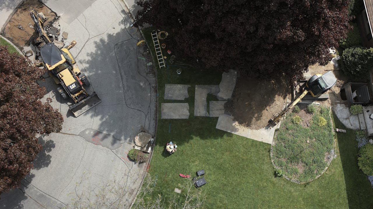 Overhead view of site with truck and property