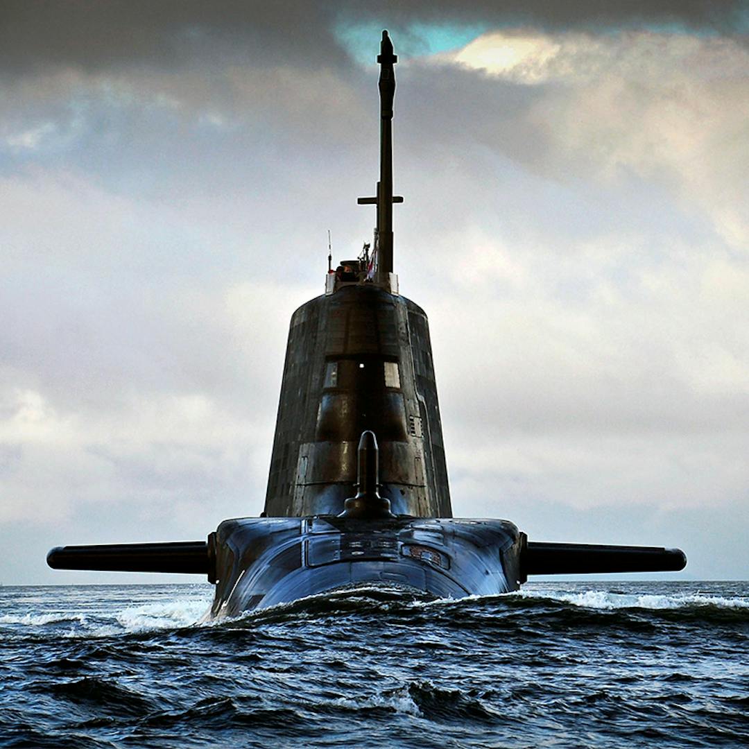 A submarine rising out of the sea.