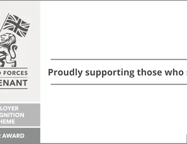 Silver Award badge from the Ministry of Defence Employer Recognition Scheme, recognising employer support for the Armed Forces community