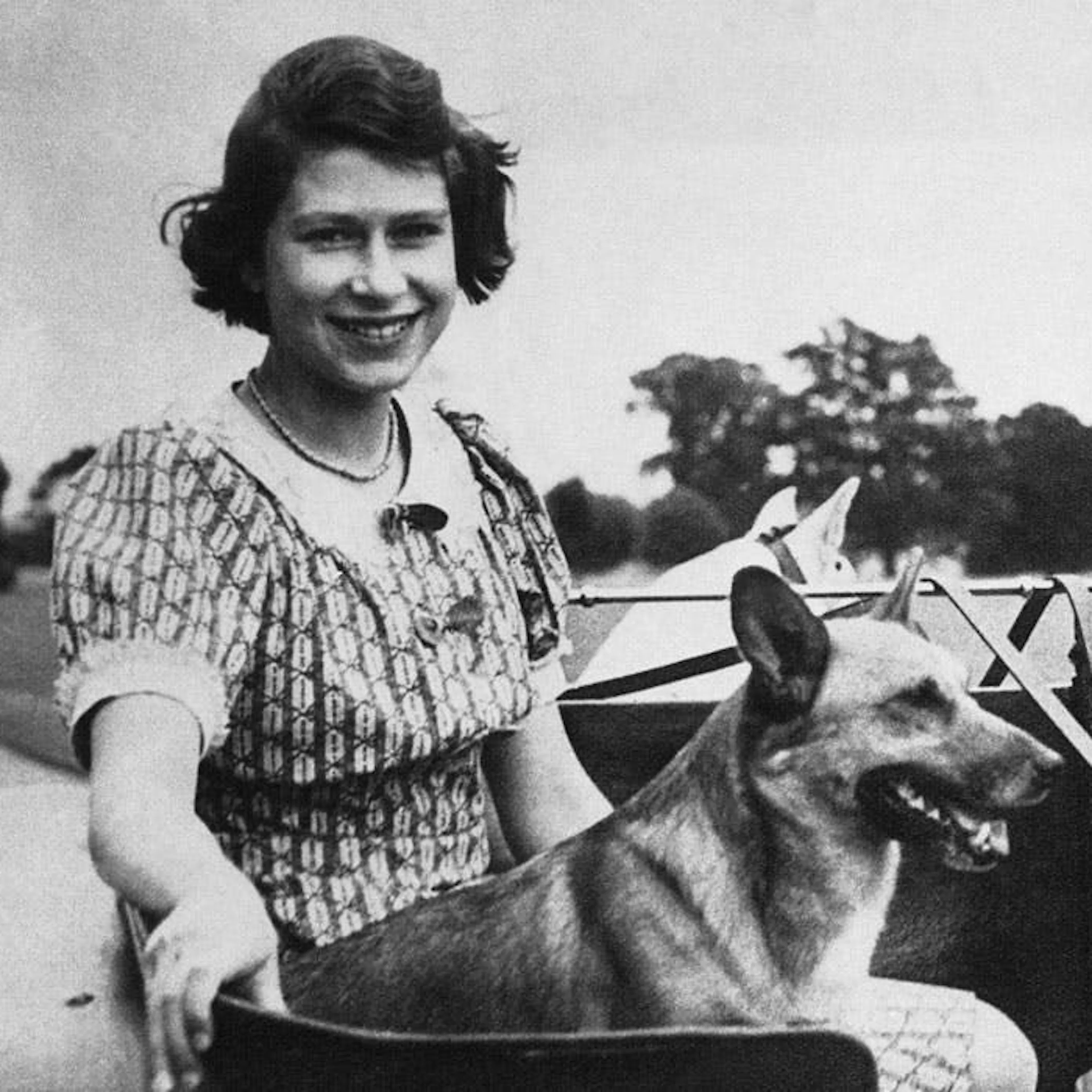 The queen and princes margaret as children with dog