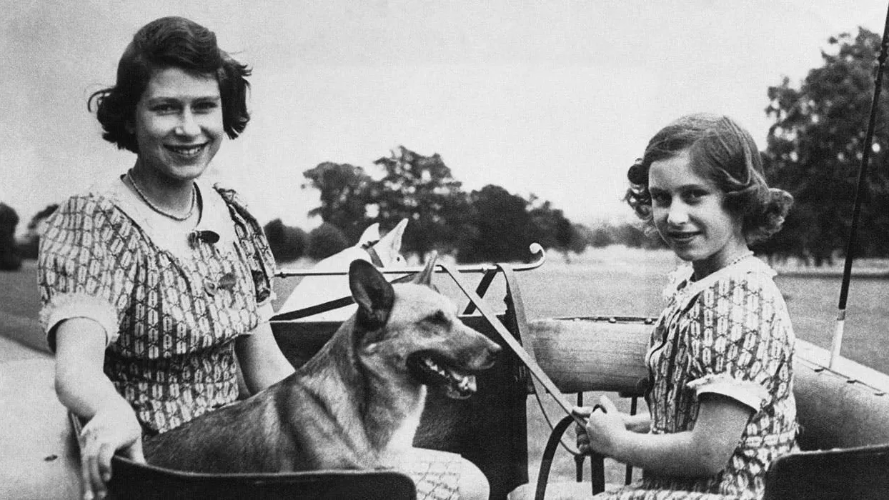 The queen and princes margaret as children with dog