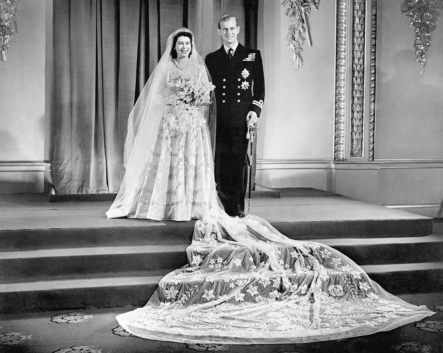 The queen and prince philip on their wedding day