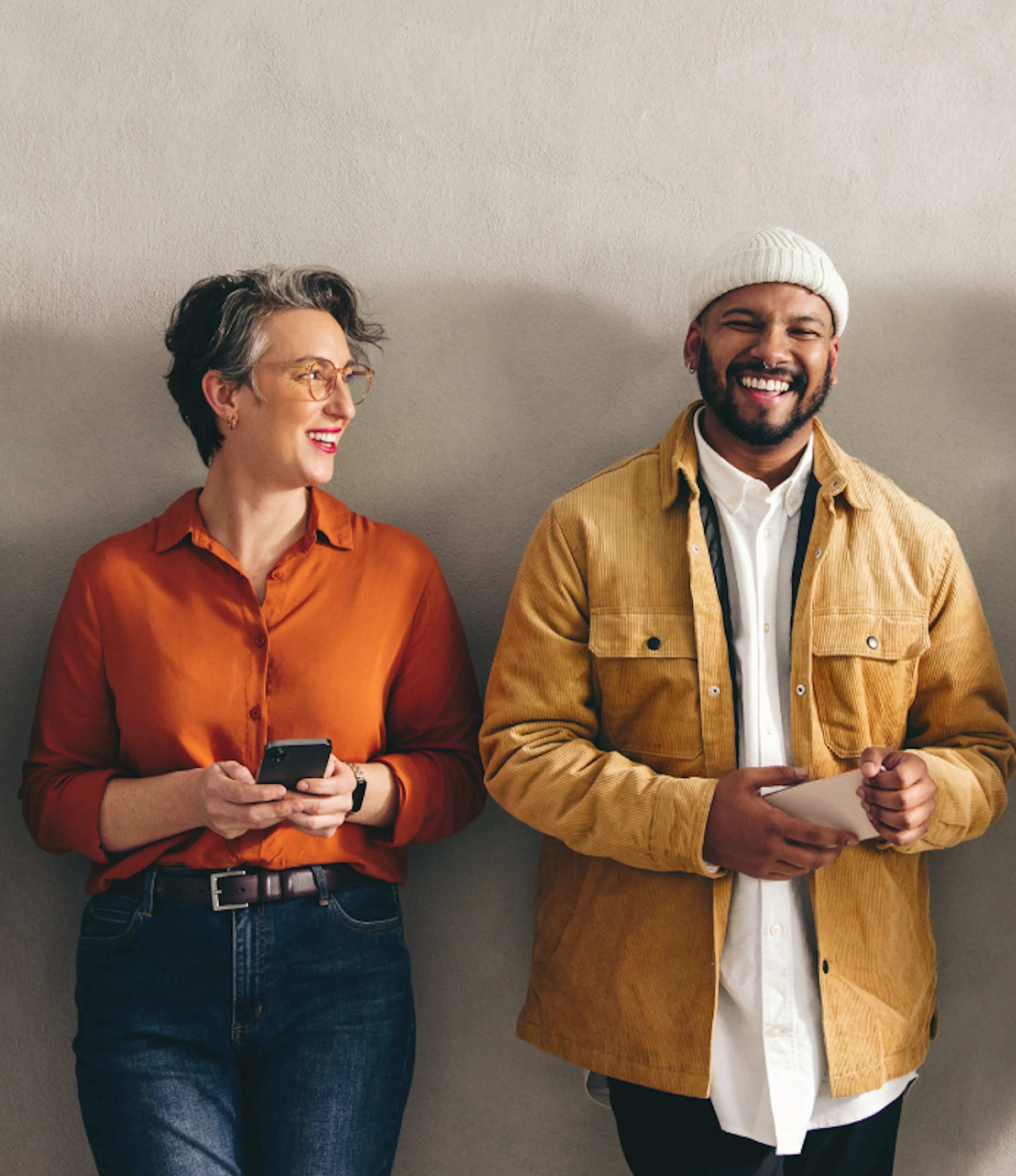 Diverse group of workers smiling.