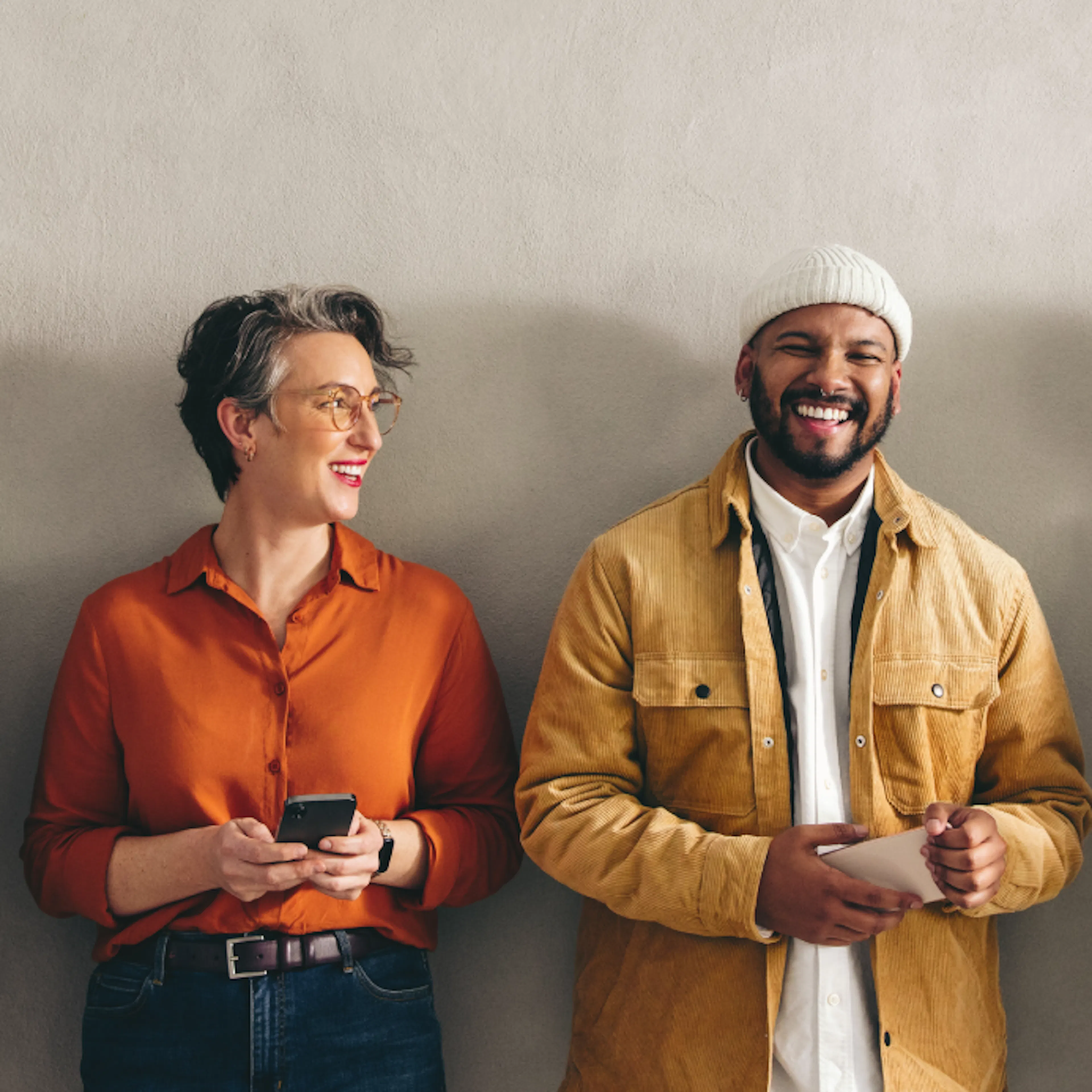 Diverse group of workers smiling.