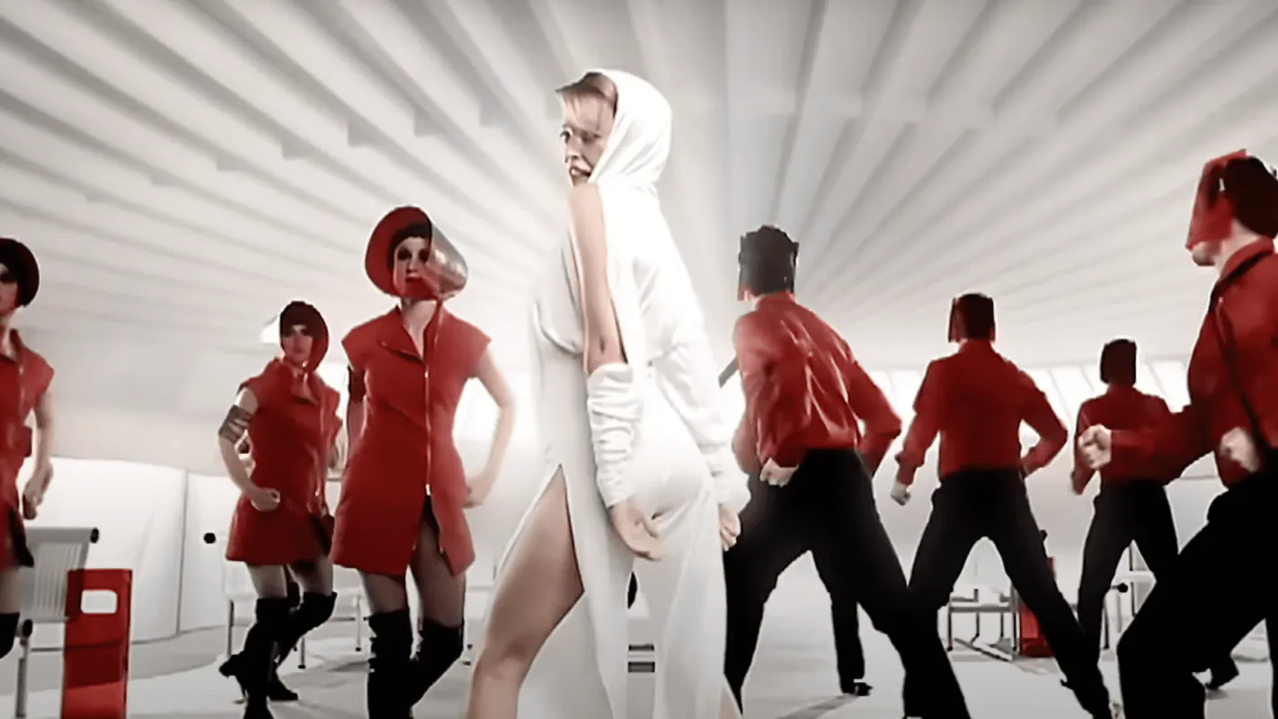 Still from Can't Get You Out Of My Head music video