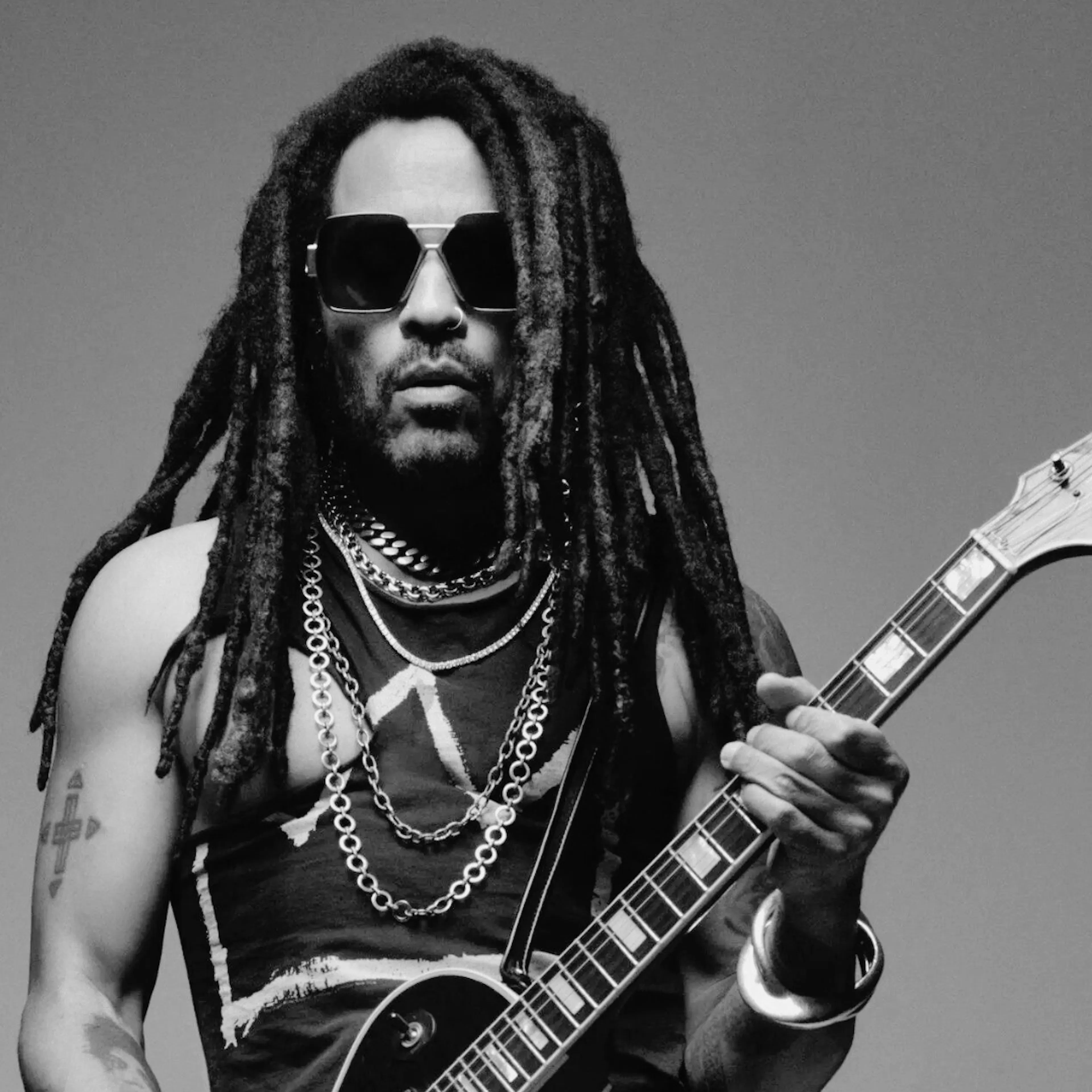 Lenny Kravits holding guitar