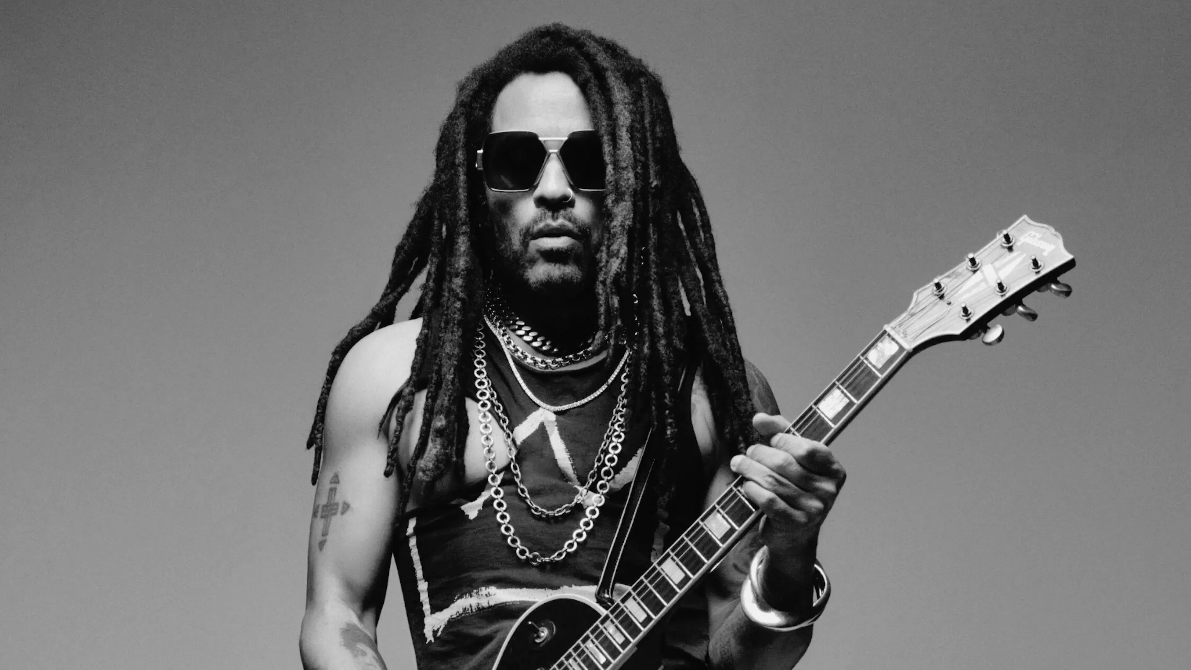 Lenny Kravits holding guitar