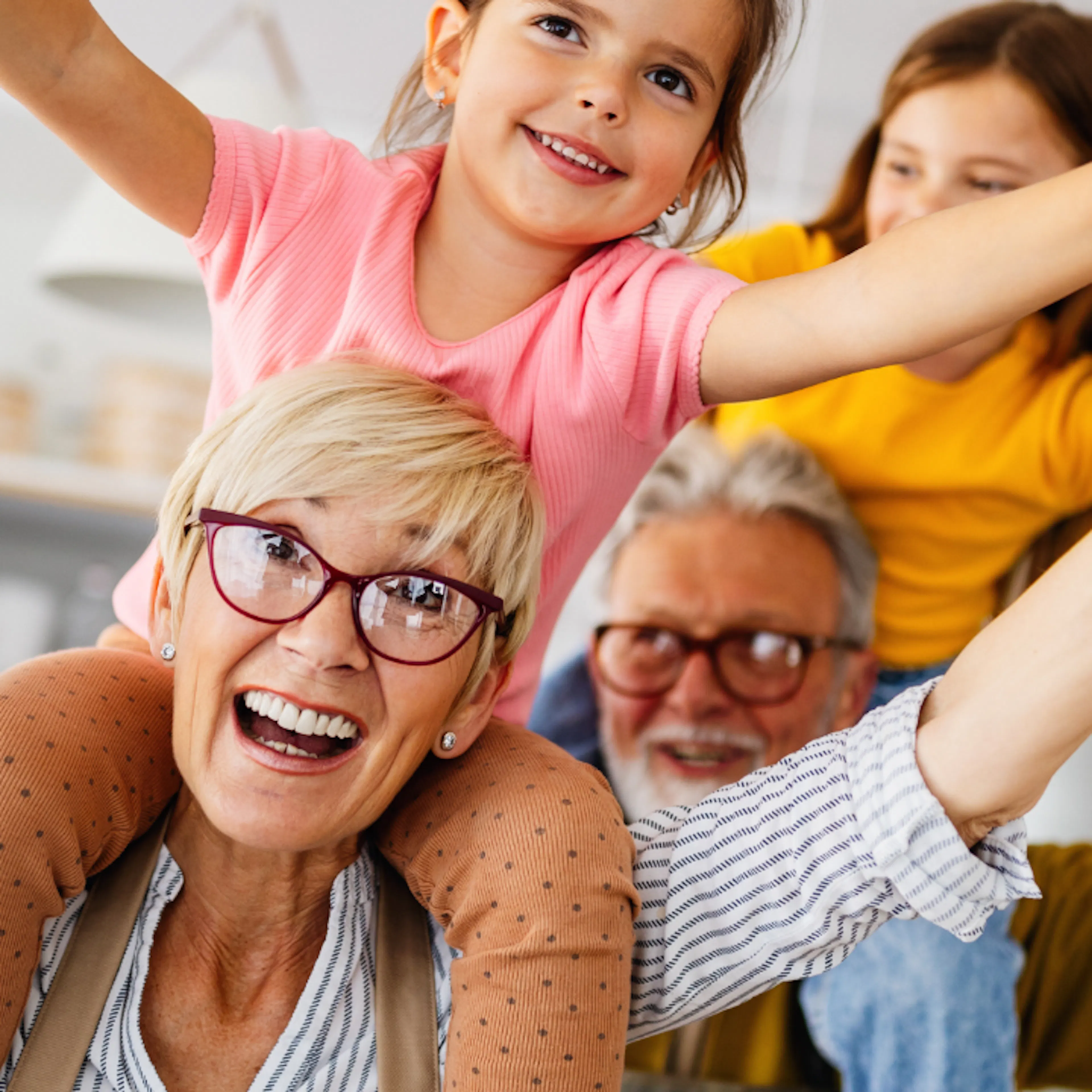 Grandparents Having Fun With Their Kids