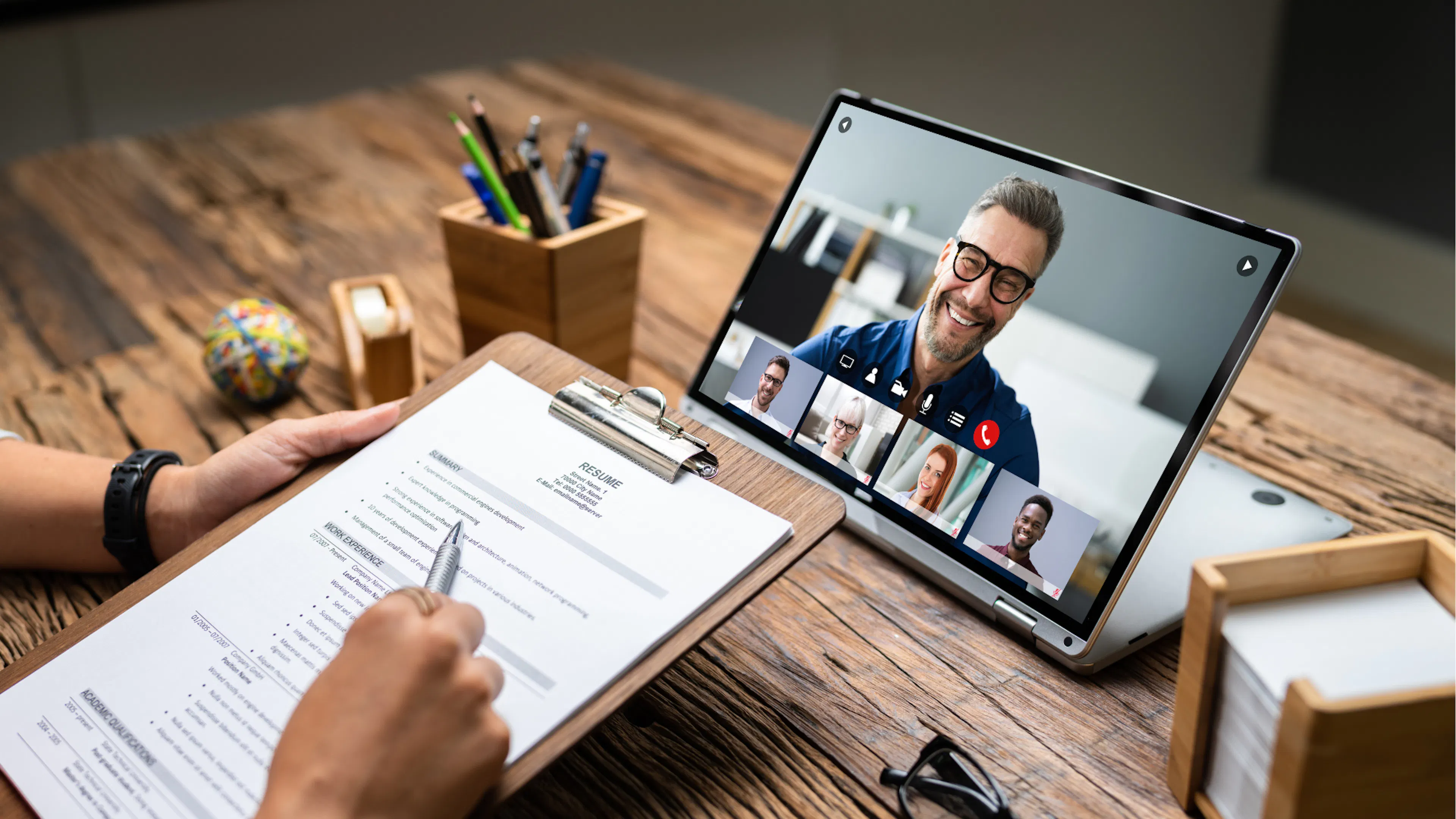 Male on screen being interviewed by person off camera