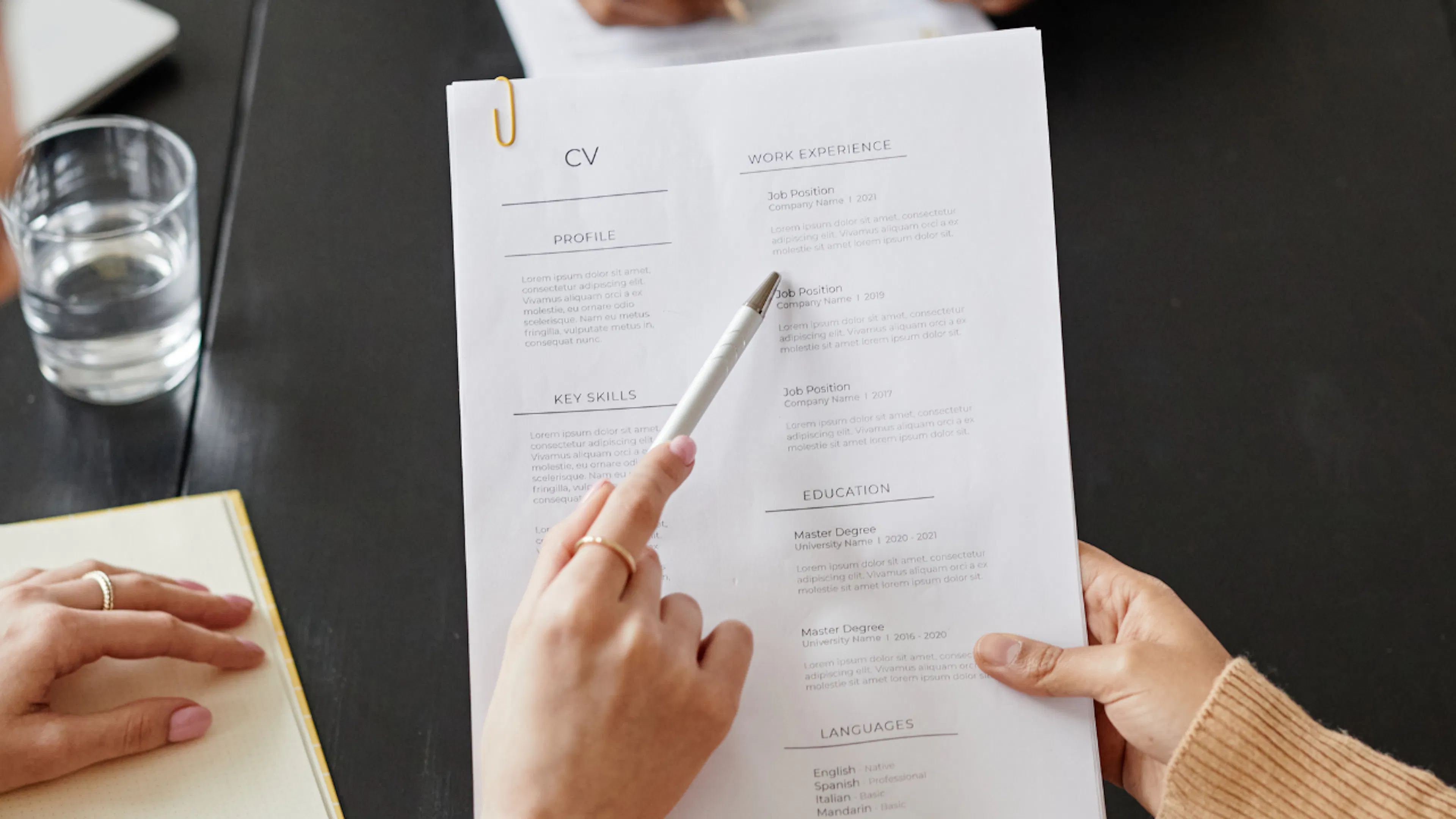 Two women looking at someones CV