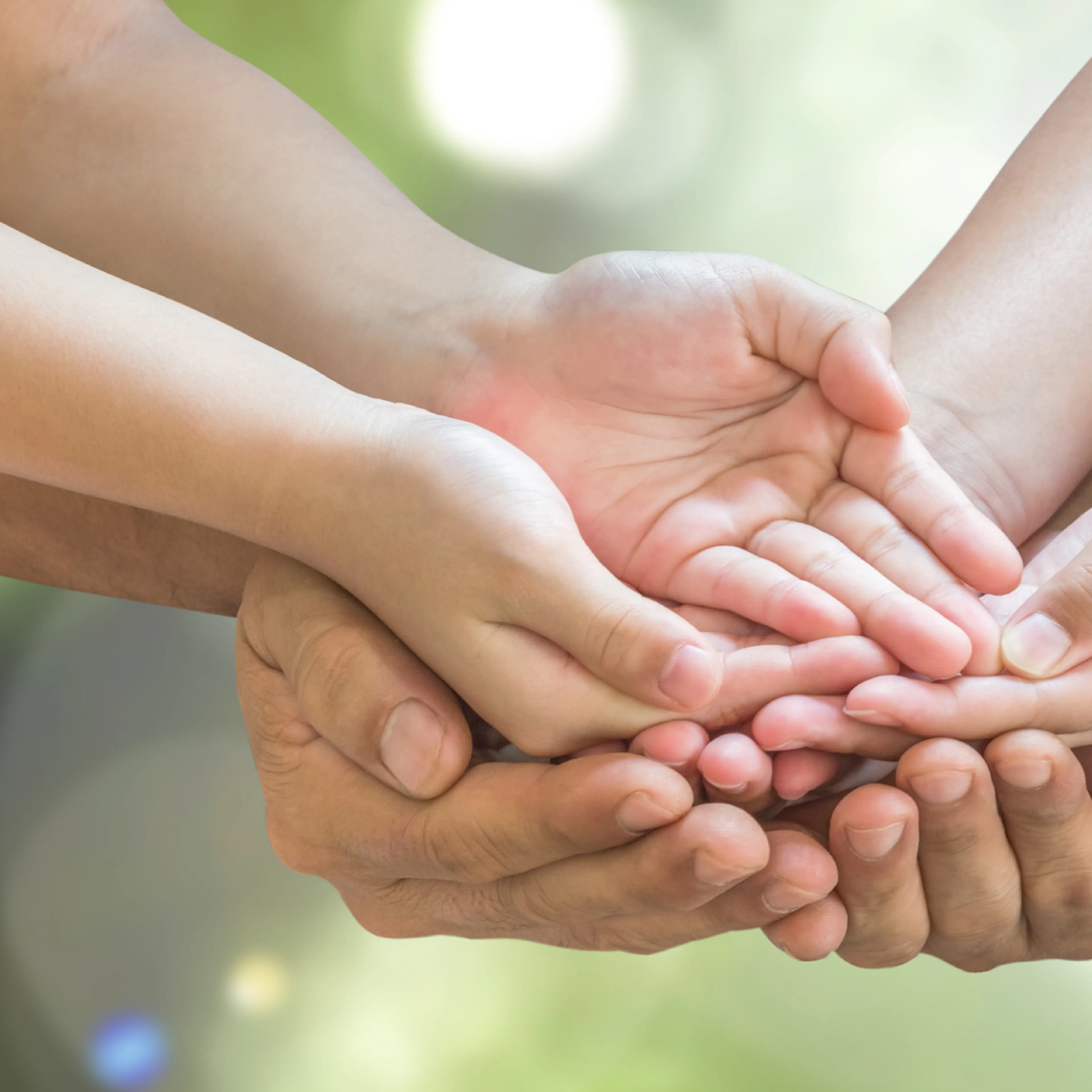 Several people's hands together