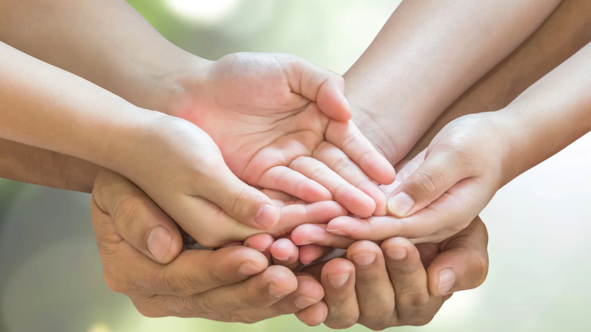 Several people's hands together