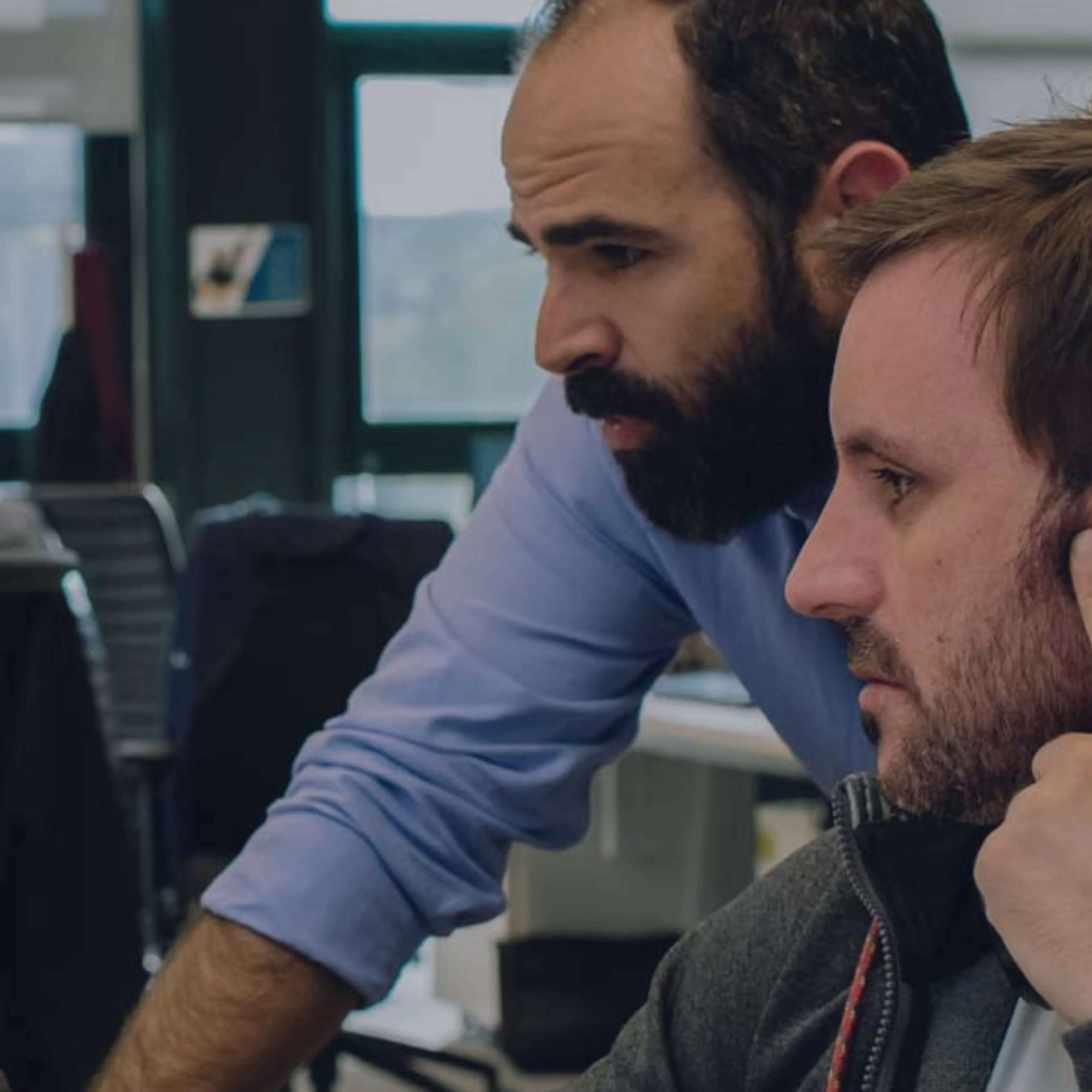 Two developers working on a project at The Workshop