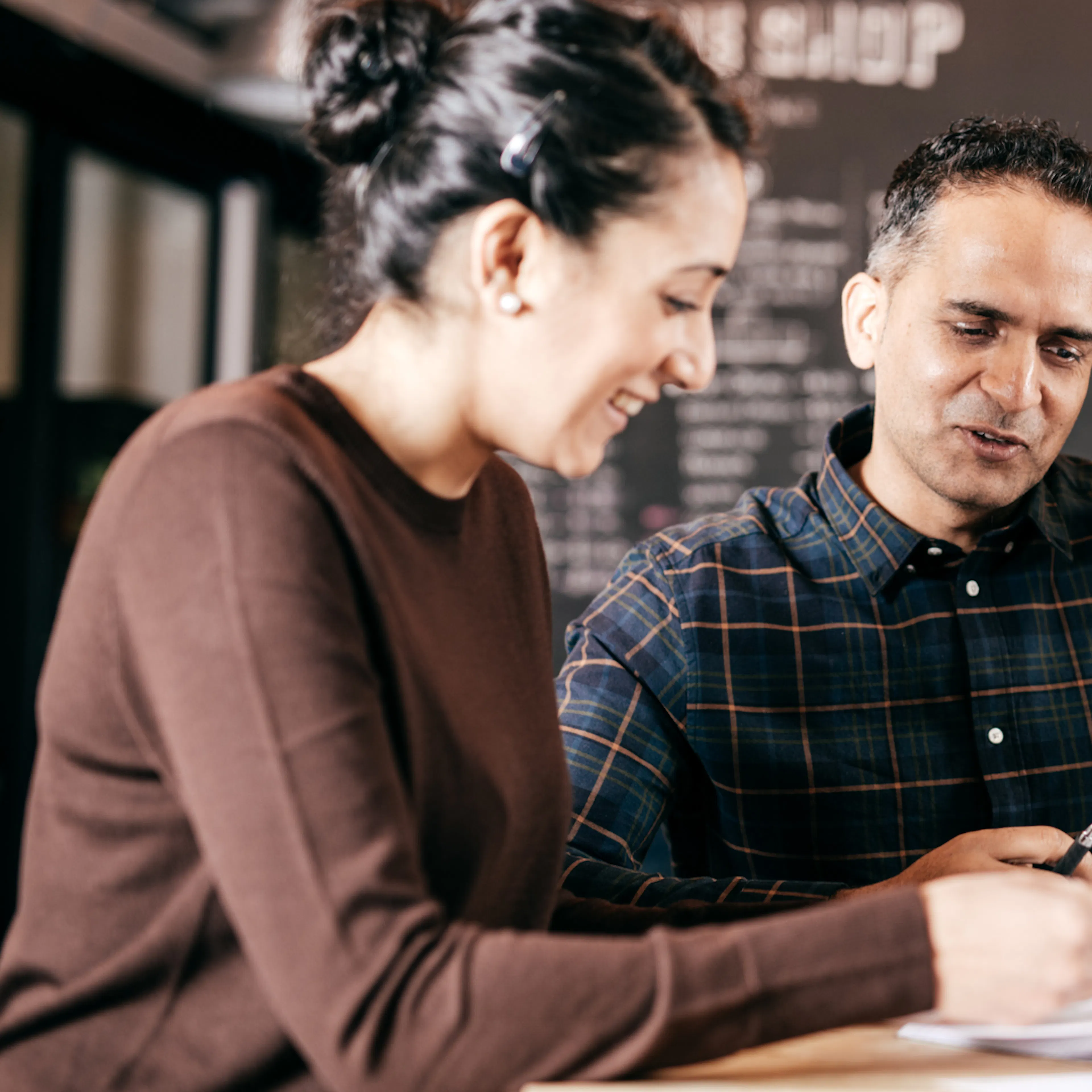 group of three having a meeting 