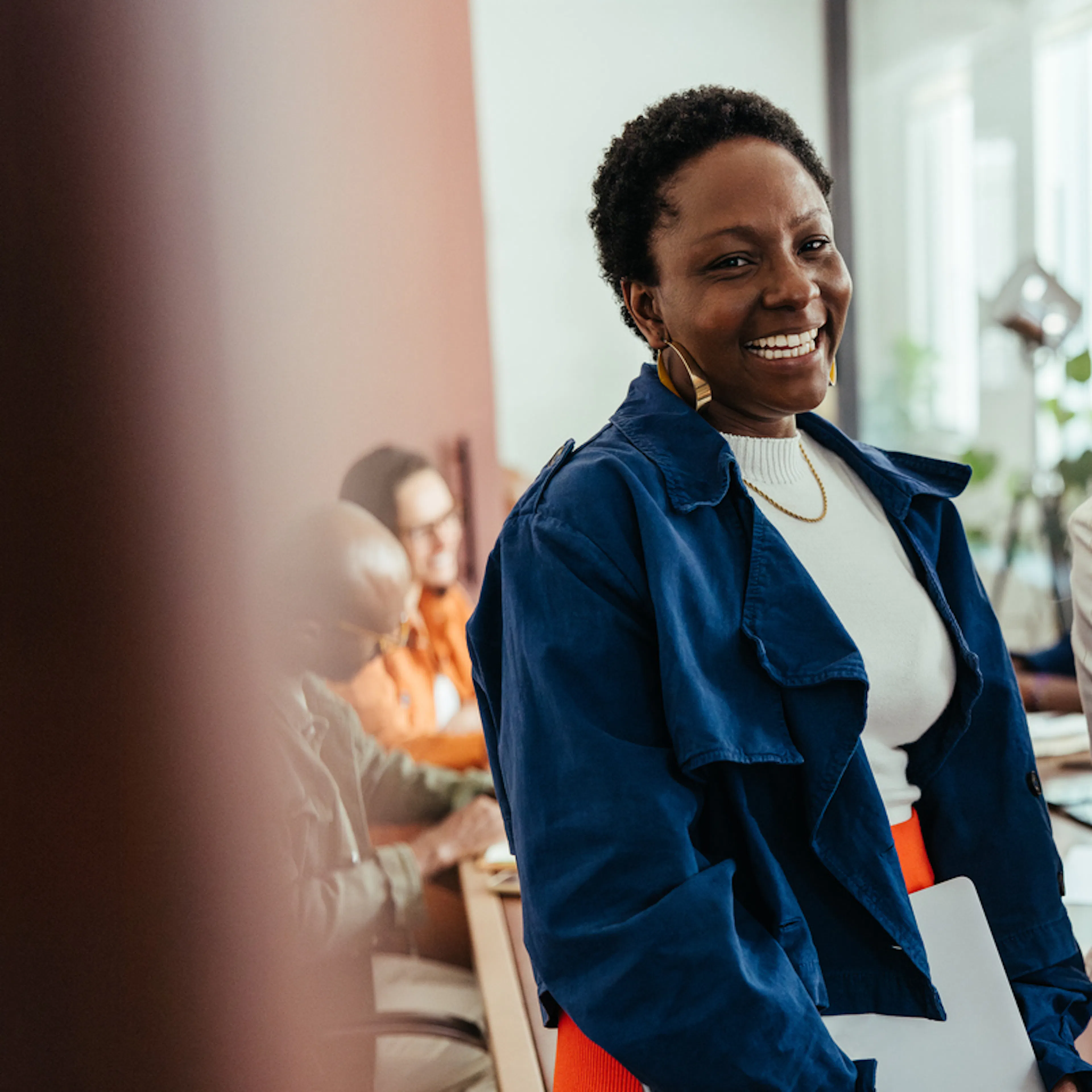 two women smiling at work

