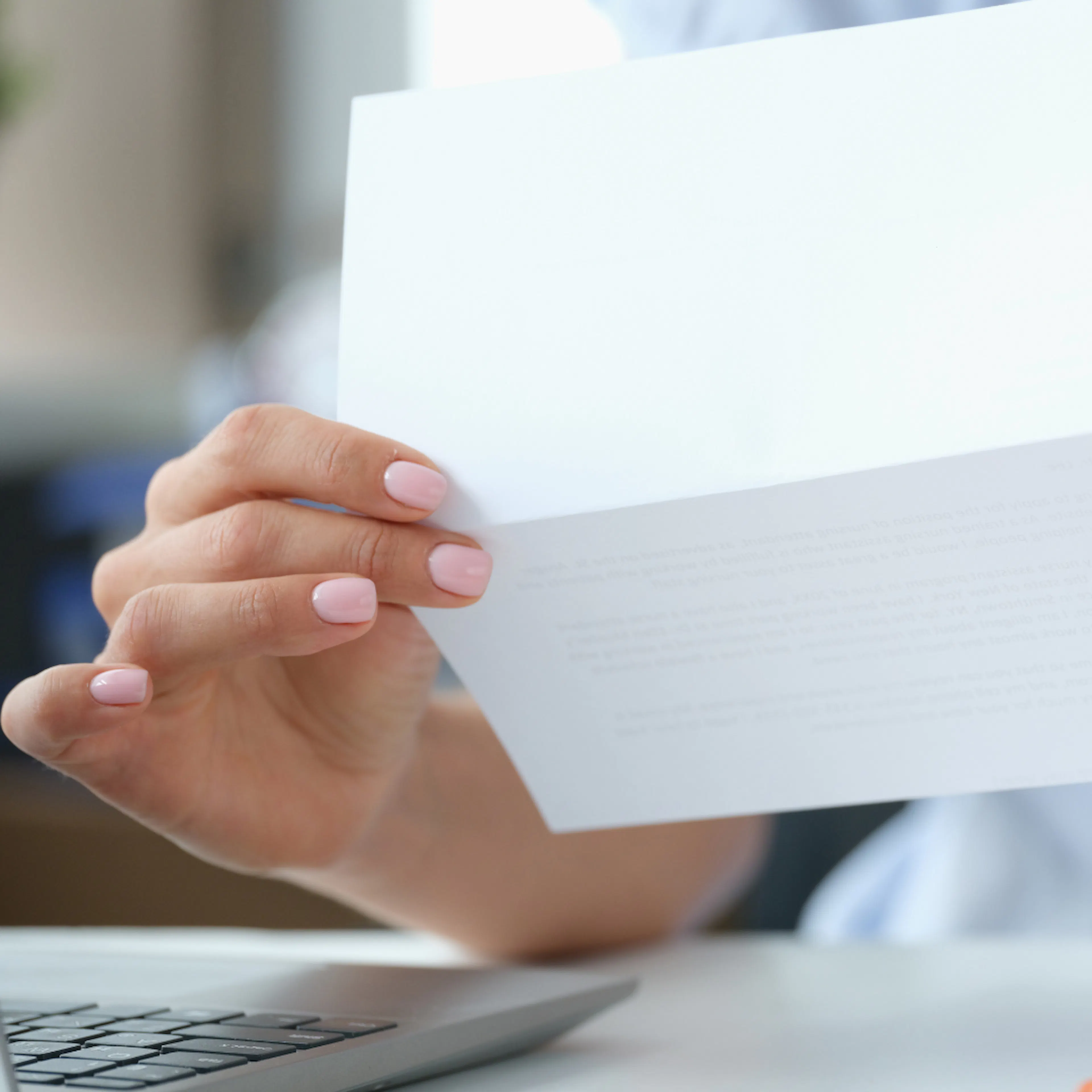 Hands holding a letter