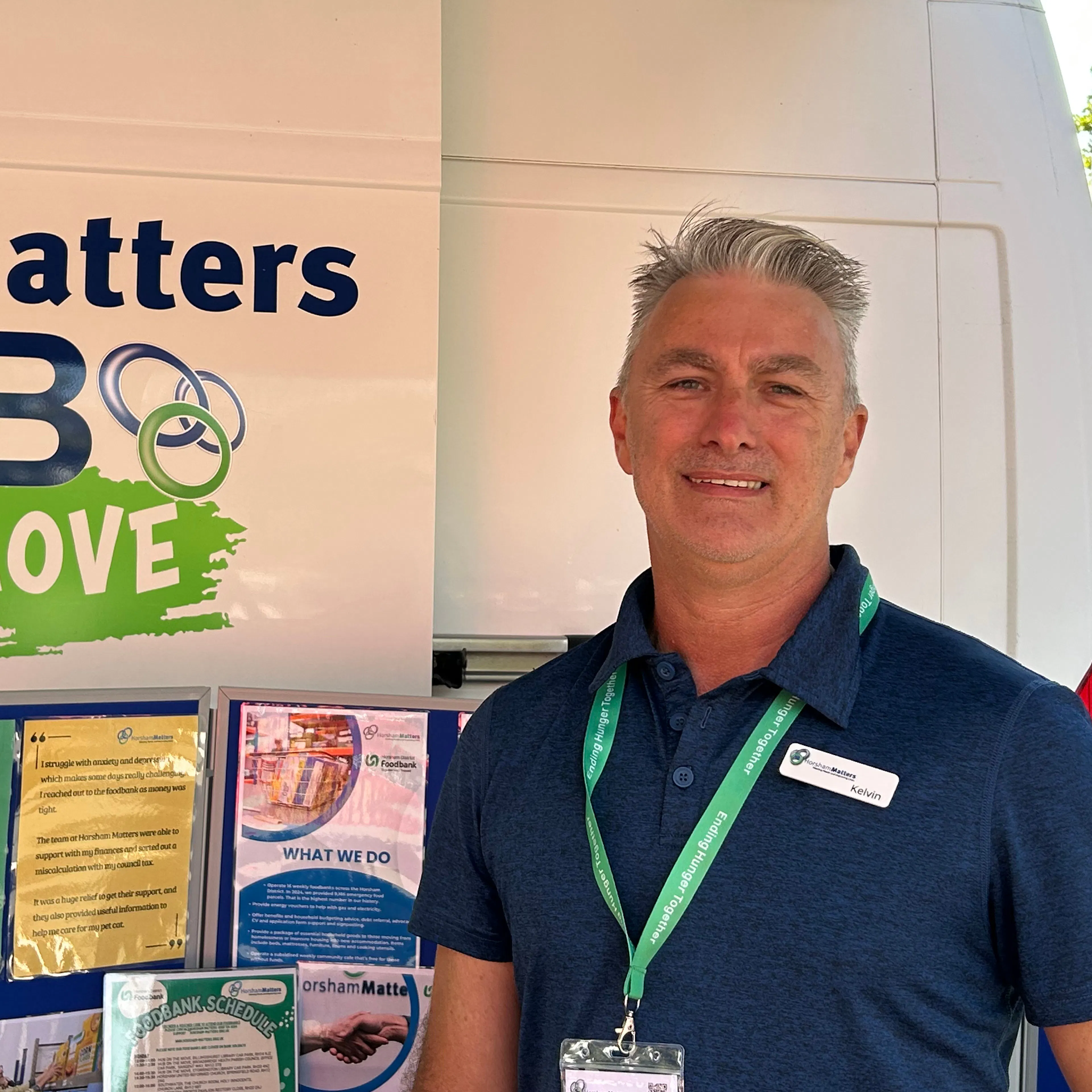 Portrait of Kelvin in front of mobile hub