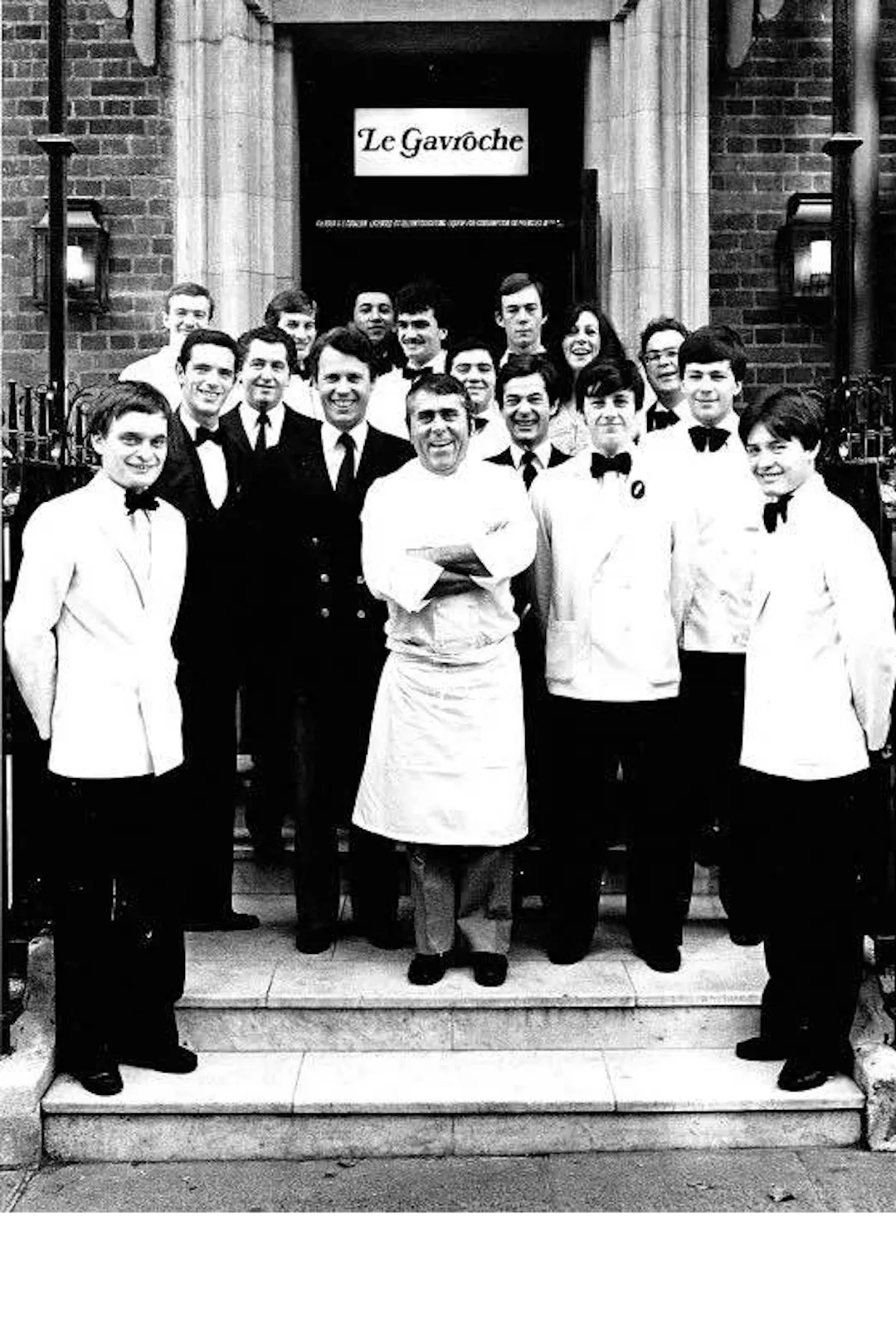 Albert Roux on the steps to Le Gavroche with his unformed team