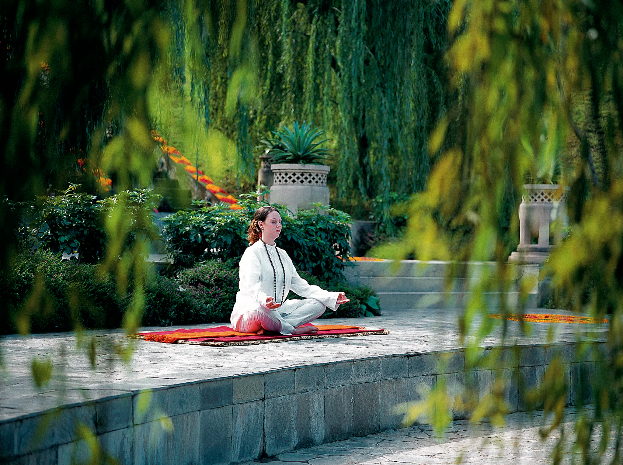 female meditating outside