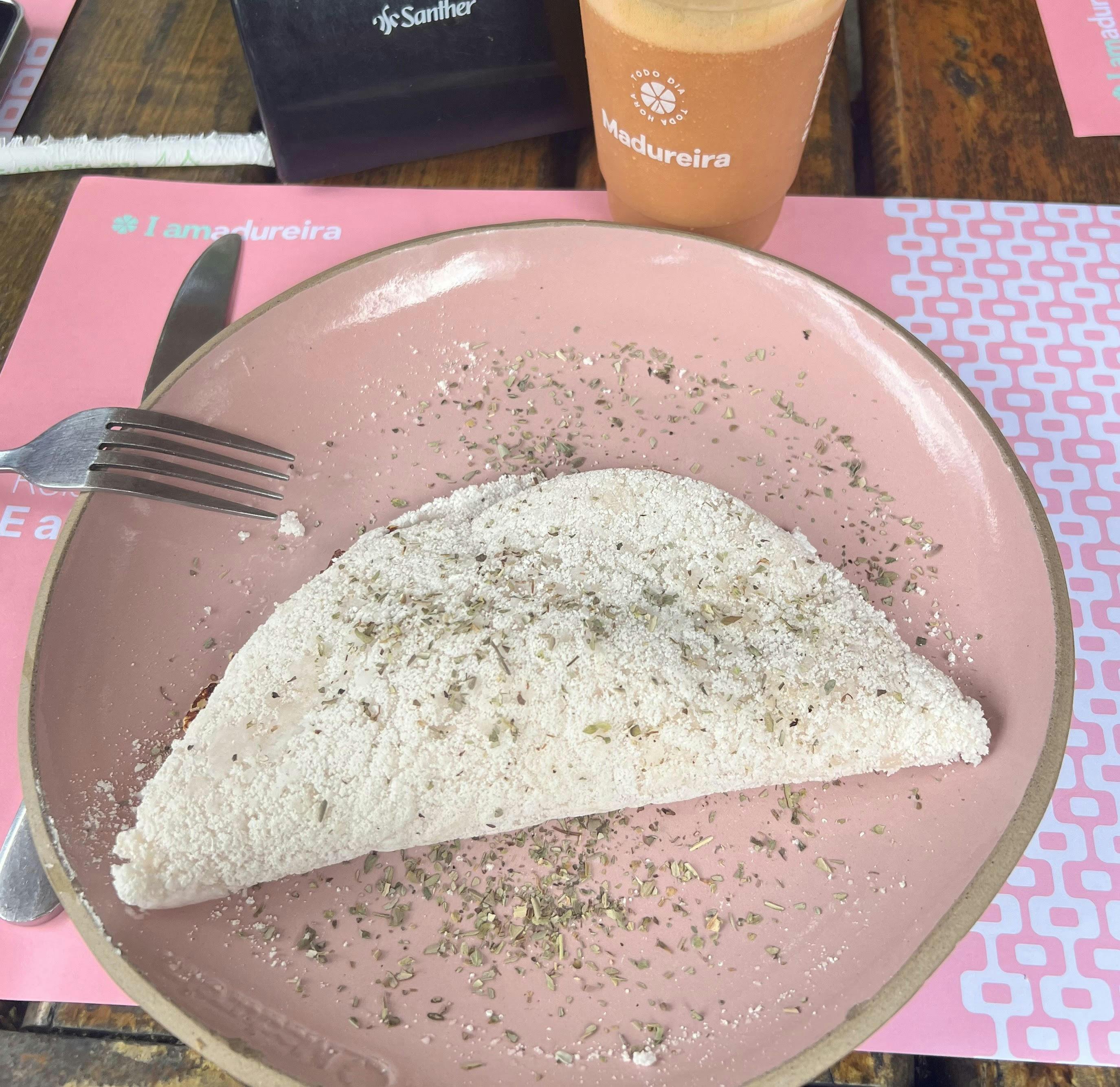 A picture of a tapioca wrap with oregano. 