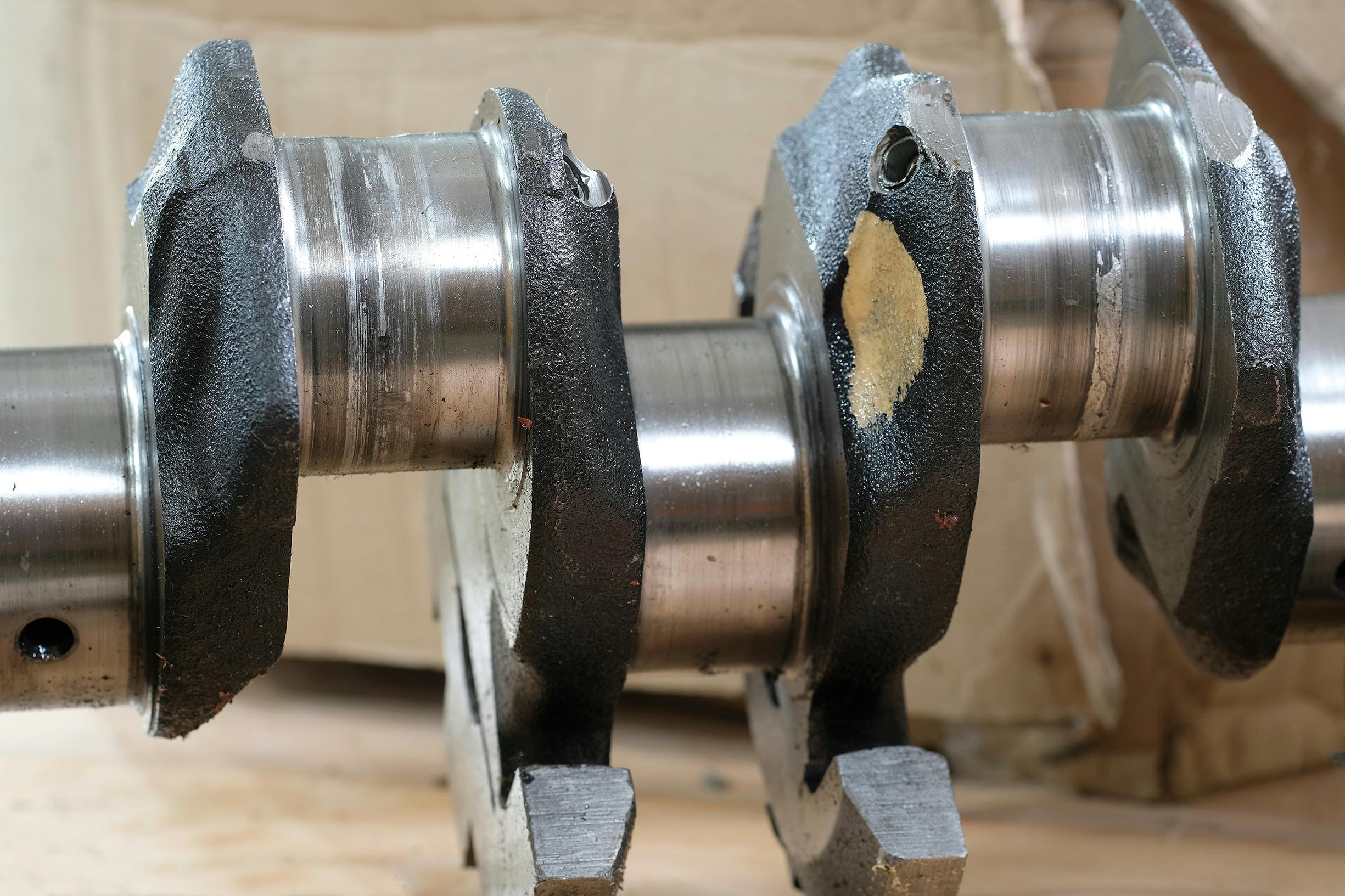 a damaged crankshaft from an engine