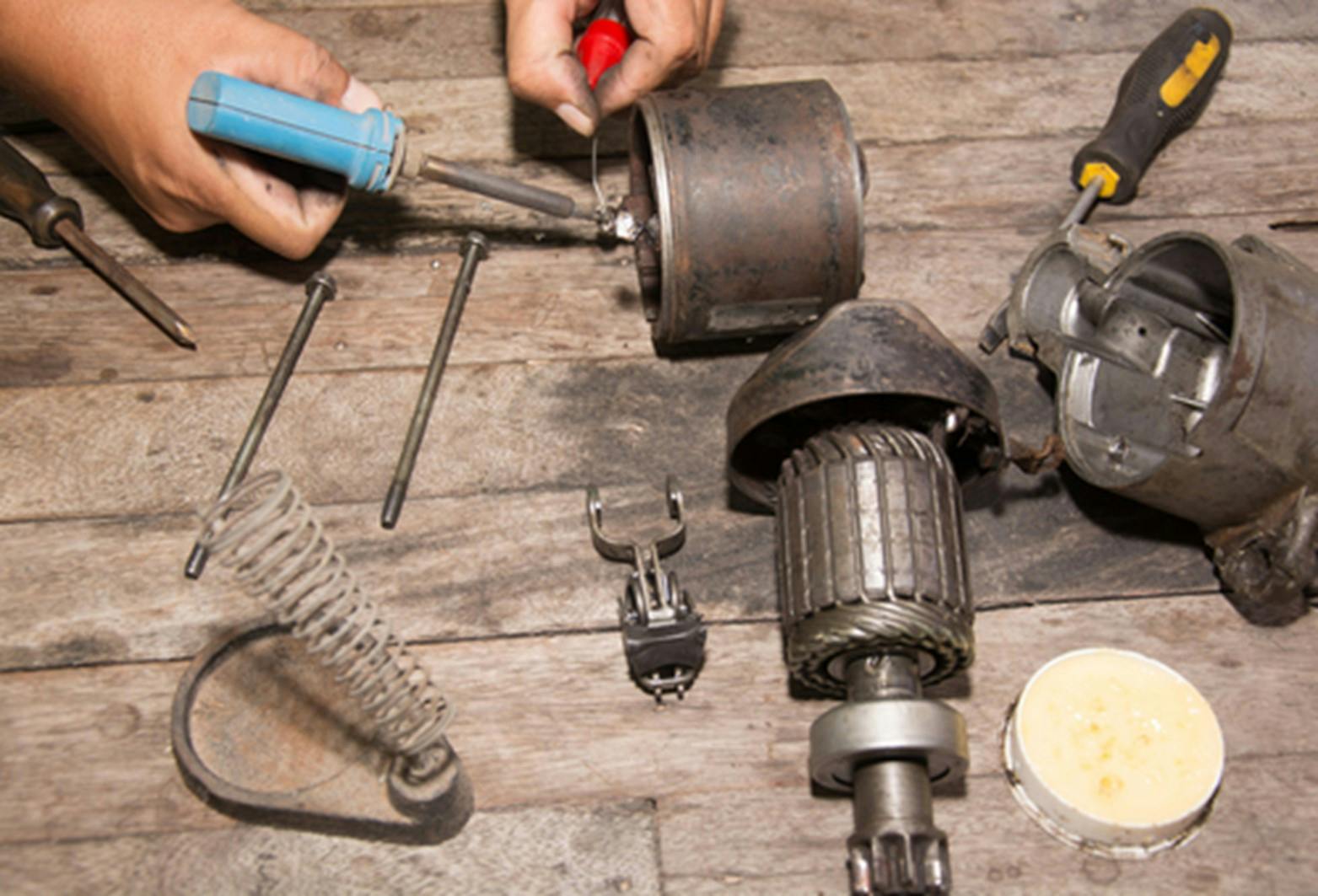 A dismantled starter motor showing the internal components