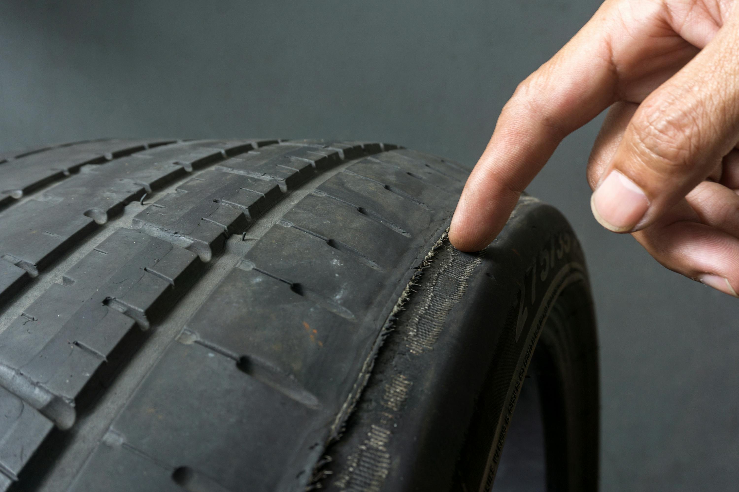 A worn car tyre caused by excessive positive camber