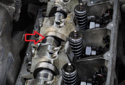 Example of a single overhead camshaft that is not placed directly over the valves