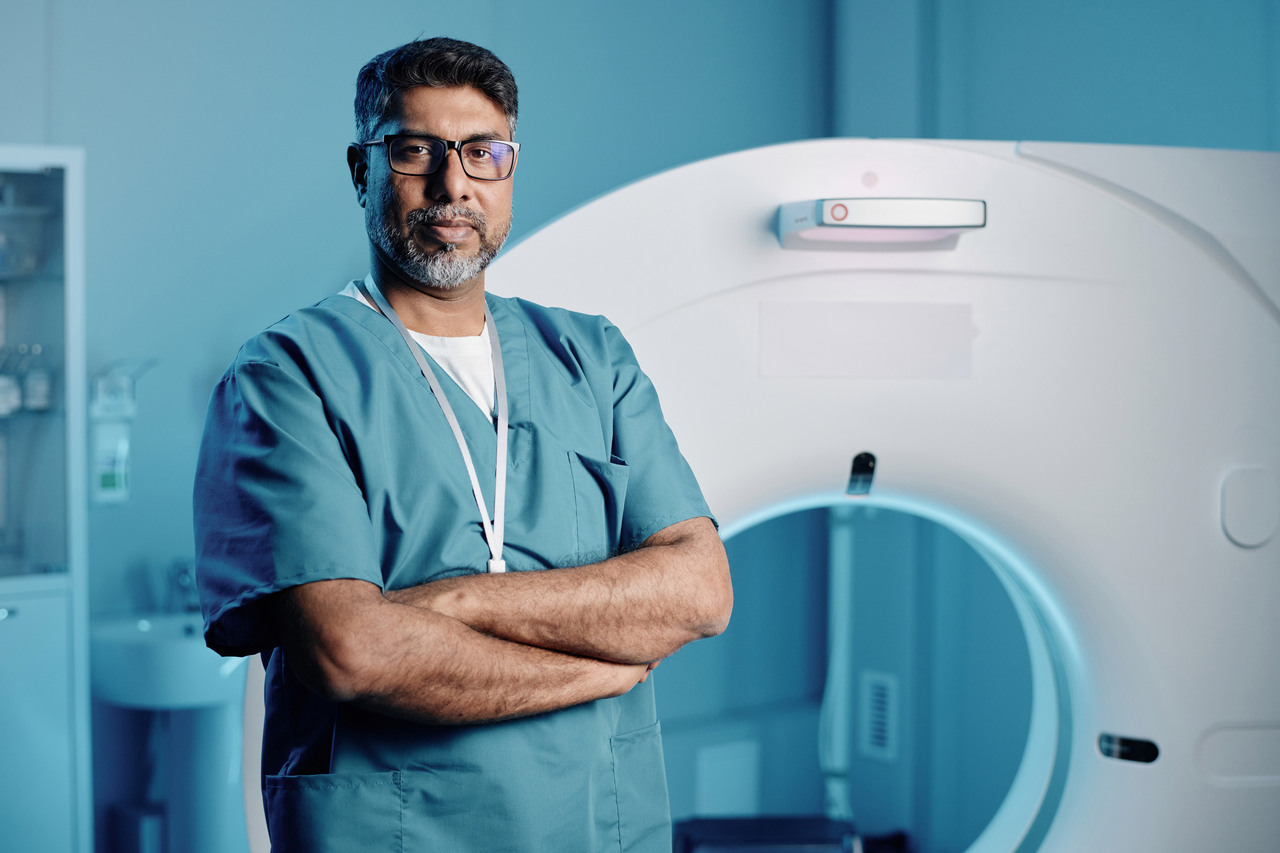 Doctor in front of MRI machine