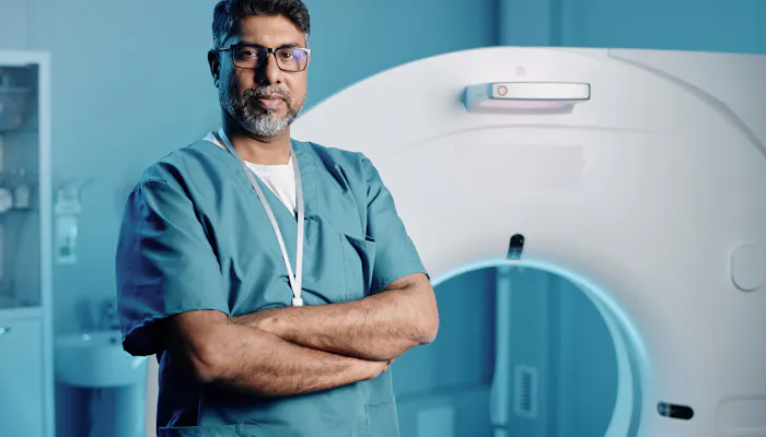 Doctor in front of MRI machine