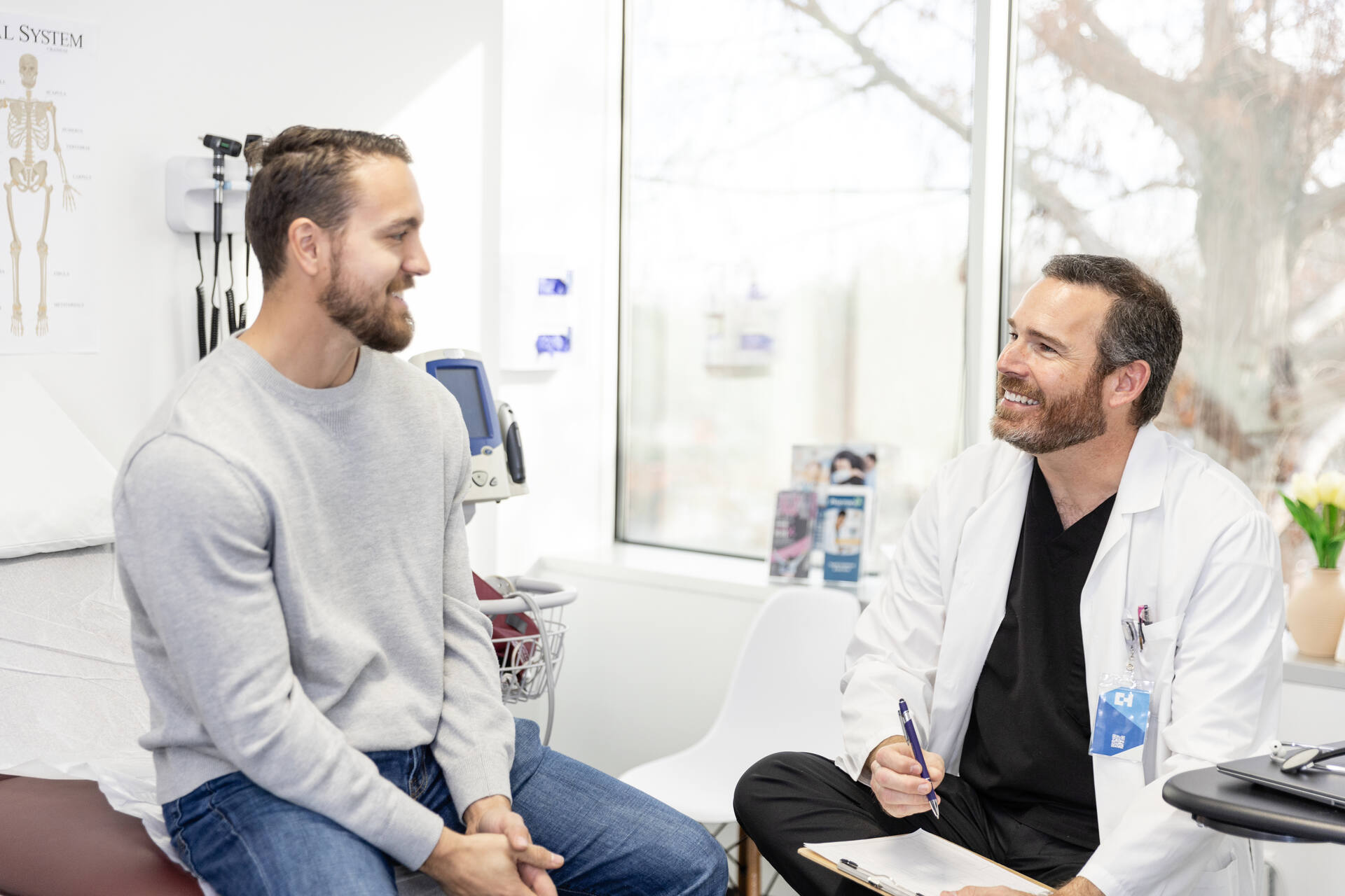Male patient speaking to doctor