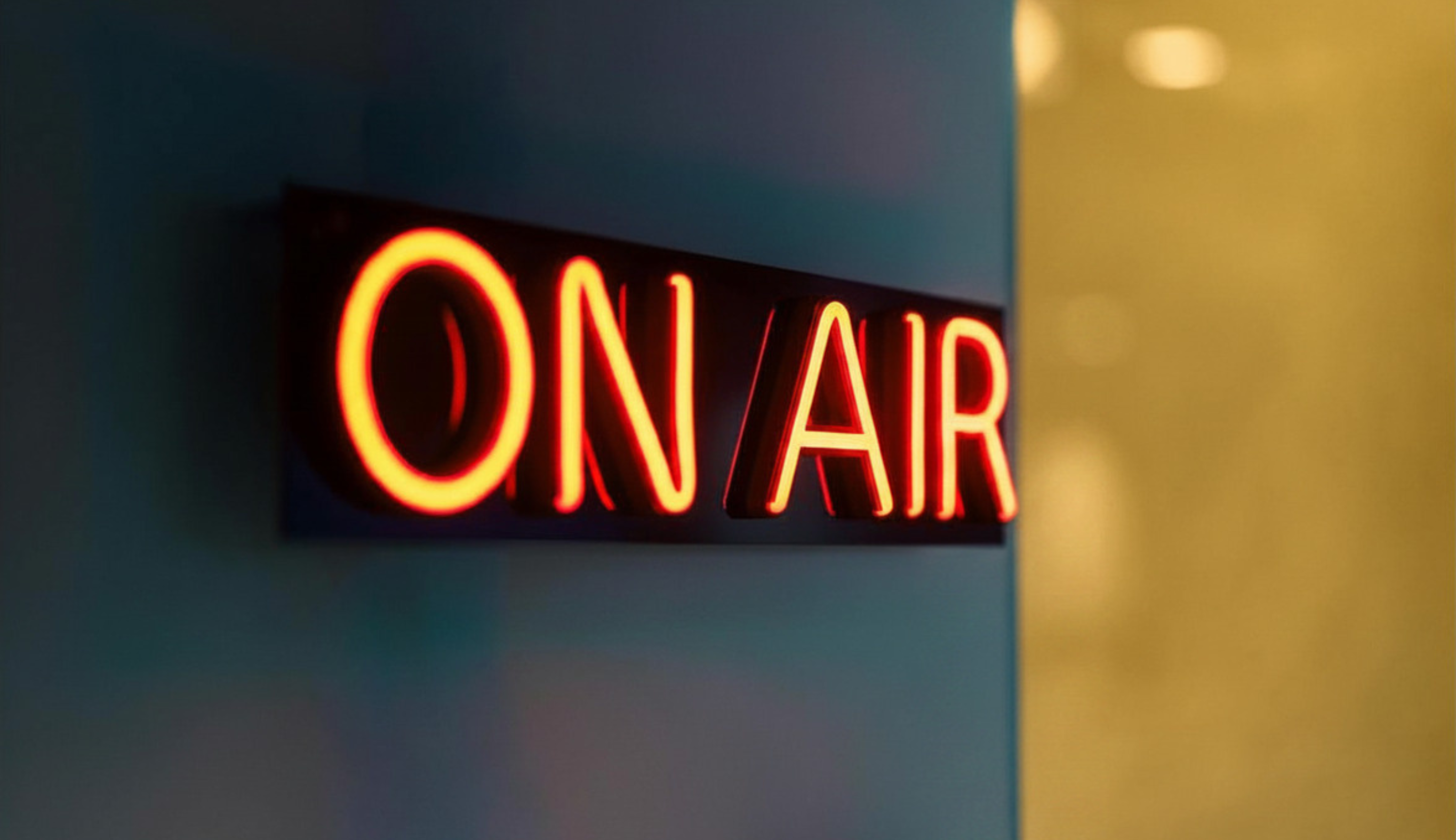 On Air sign on a navy blue wall