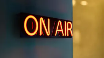 On Air sign on a navy blue wall
