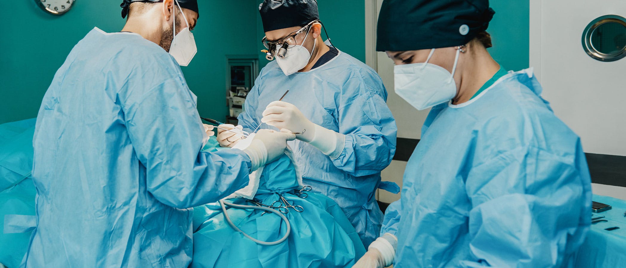 team working together in operating room