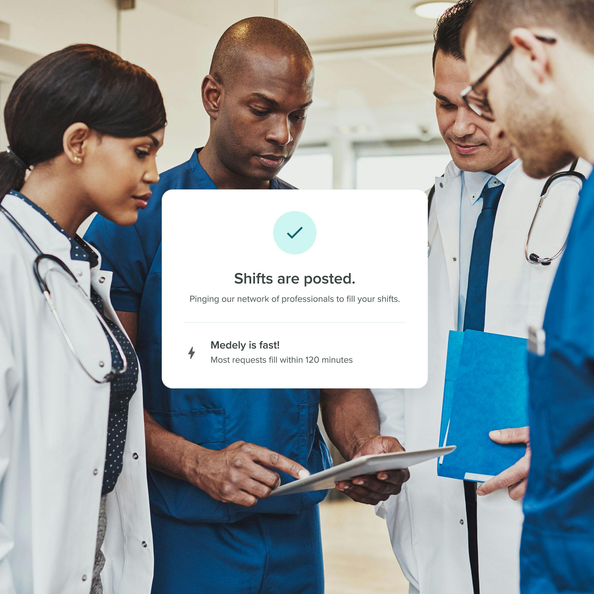 Team looking at tablet together with UI of filled shift