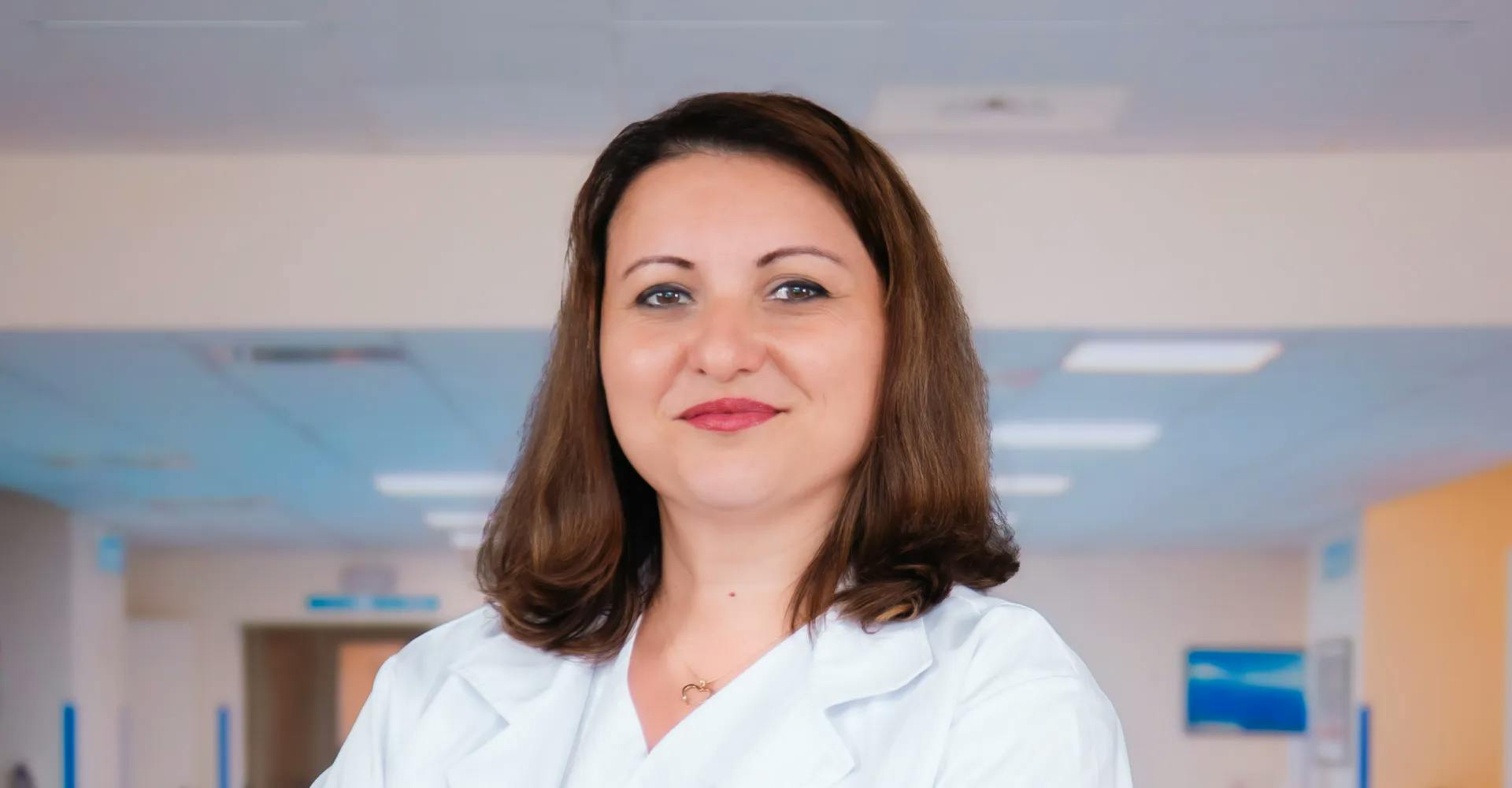 Dr. Raluca Naidin