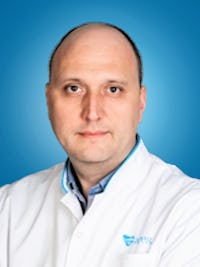 Image of Dr. Adrian Bucșă
