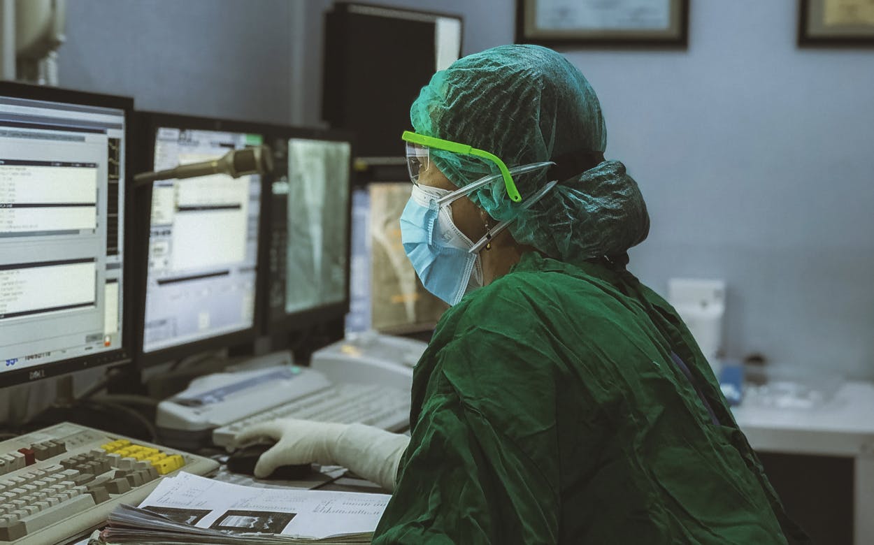 Clinic worker on computer