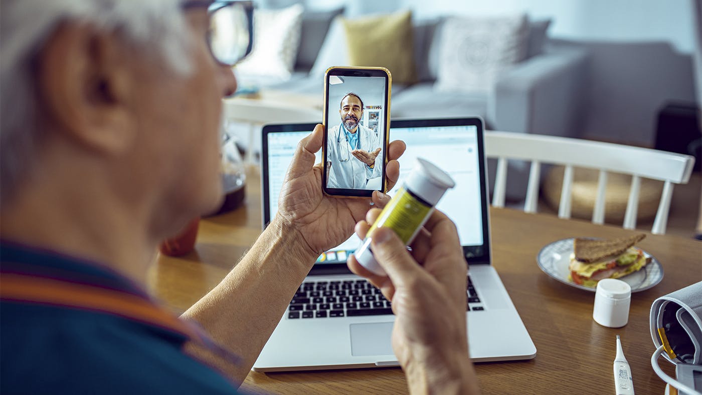 Person on video call with doctor