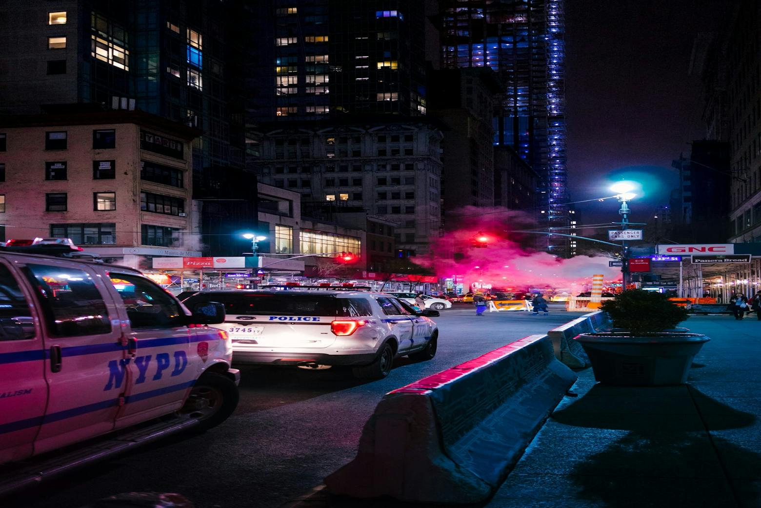 Squad cars parked on the side of the road like those purchased using opioid settlement funds.
Photo by Matteo Modica