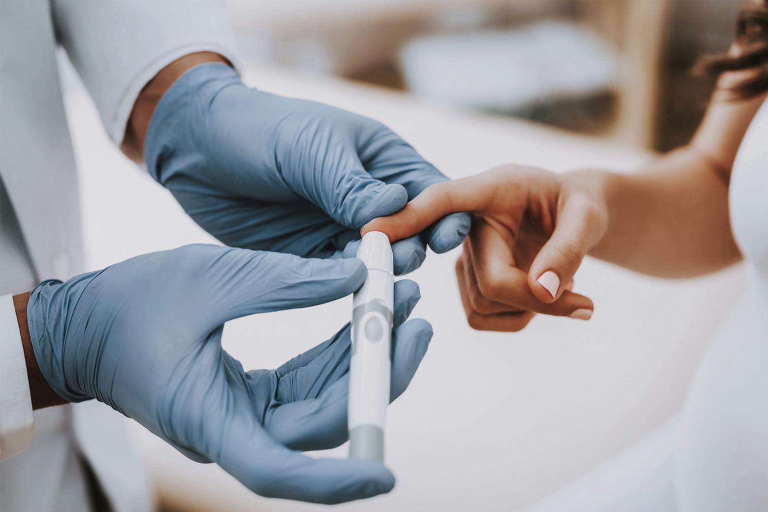 A photo of woman getting blood tested after researchers reveal new blood test for cancer detection.