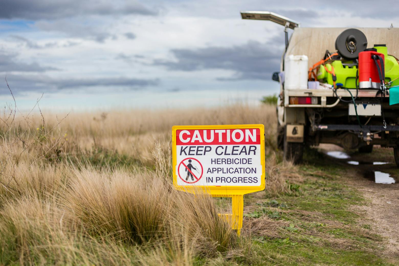 Herbicide warning representing glyphosate cancer warning labels.