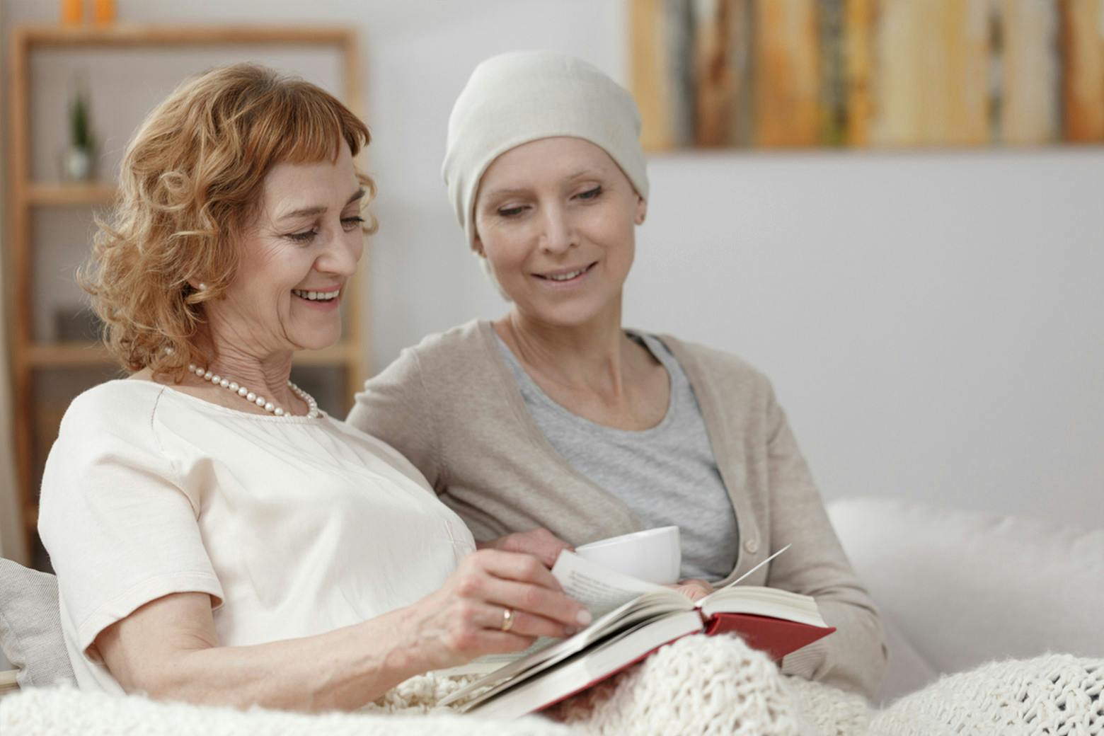 A photo of two women, one who is a cancer survivor, to demonstrate why it's important to learn about ovarian cancer.