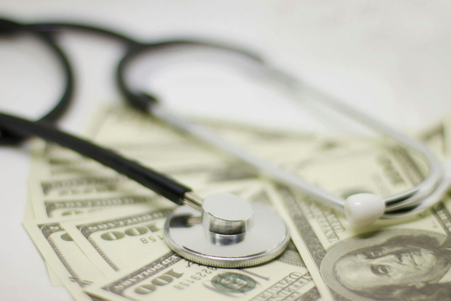 A photo of a stethoscope and settlement payout for Abilify's illegal marketing.