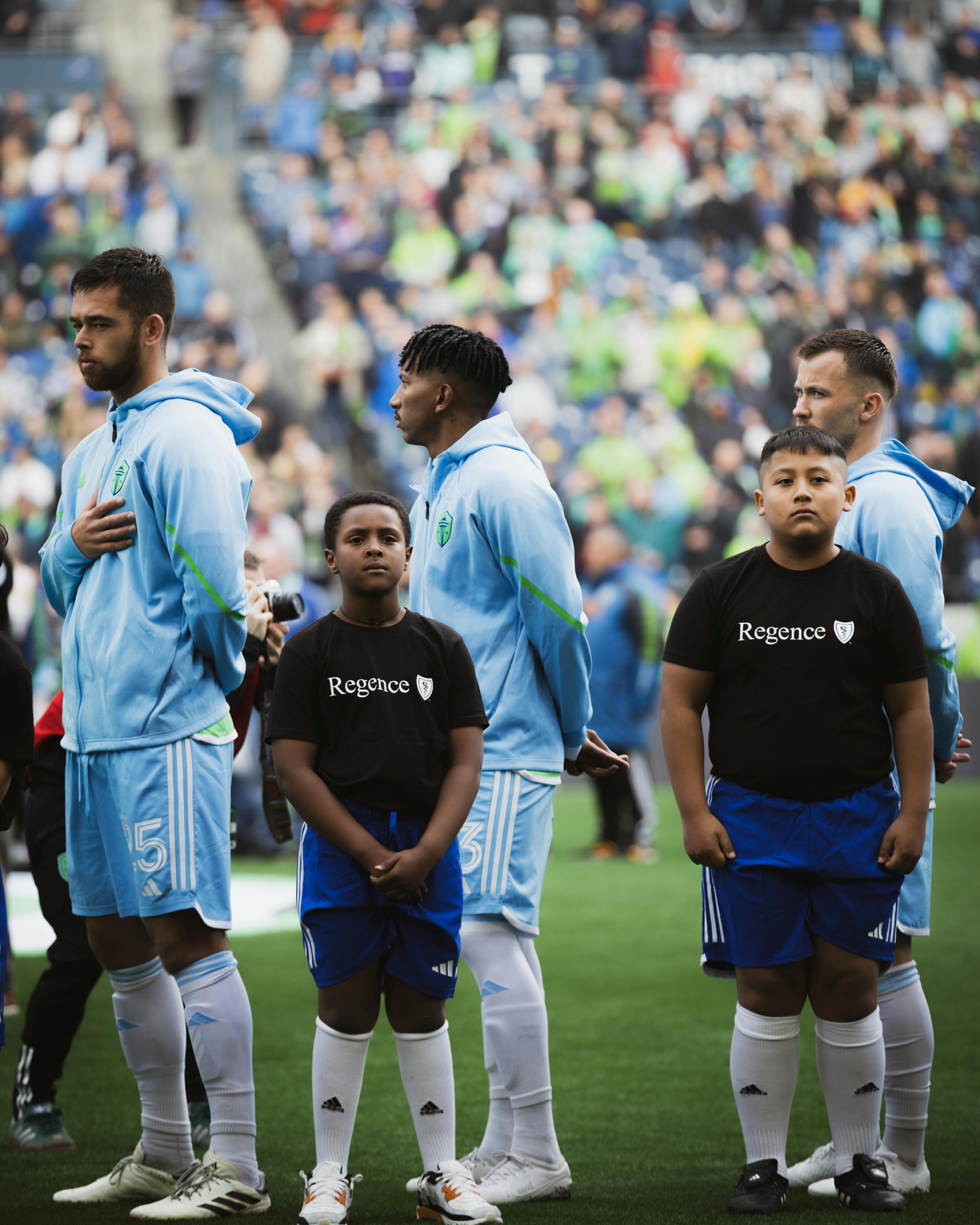 group standing for the national anthem