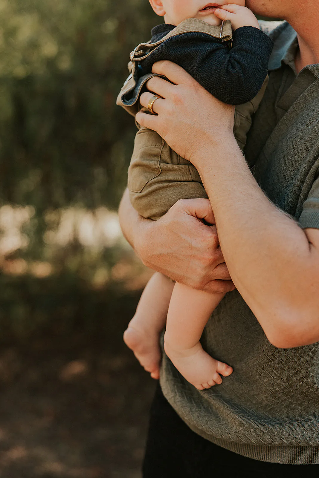 father holds son during their San Diego Family Session