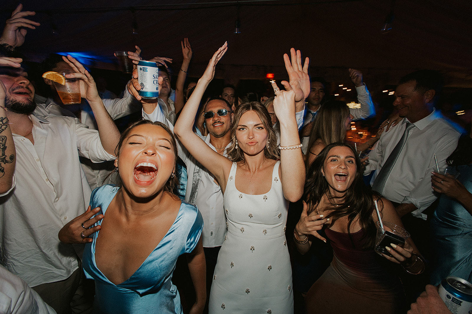 Bride and guests dancing on the dancefloor at San Diego Wedding
