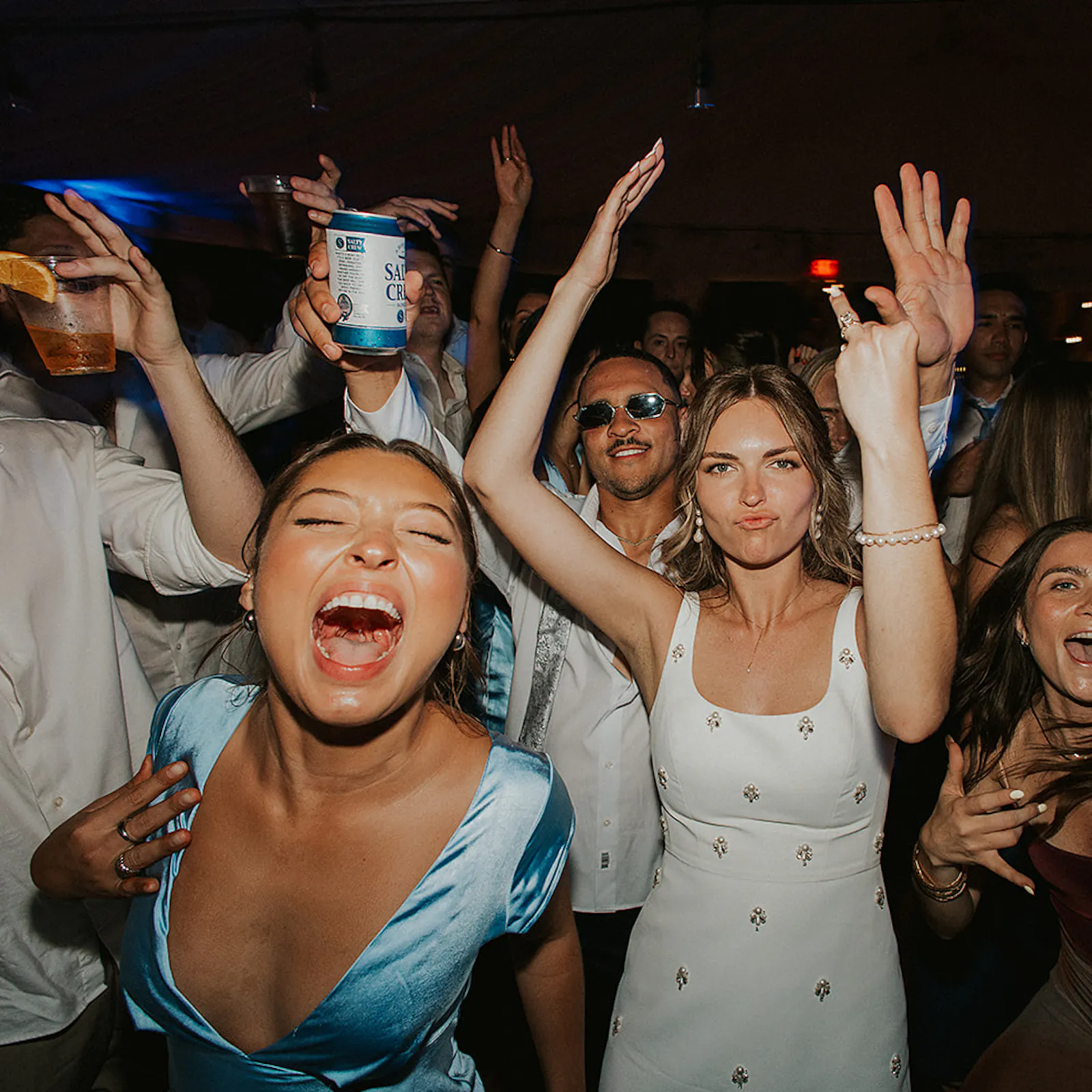 Bride and guests dancing on the dancefloor at San Diego Wedding
